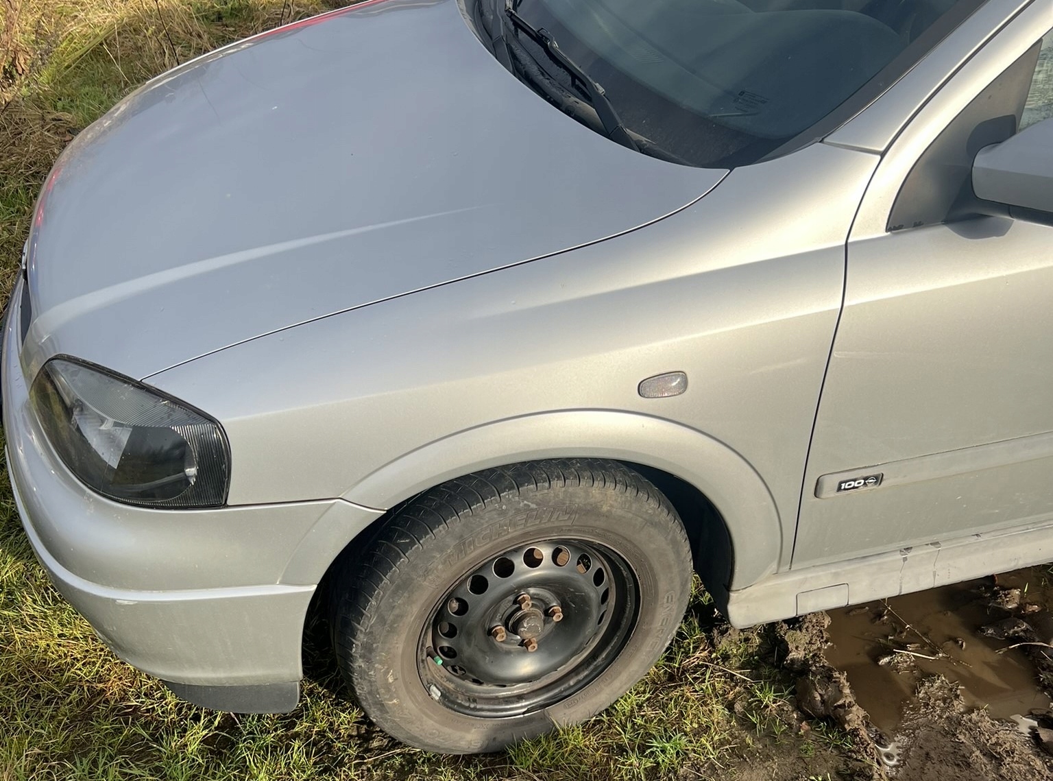 BŁOTNIK LEWY PRZÓD OPEL ASTRA G II Z147