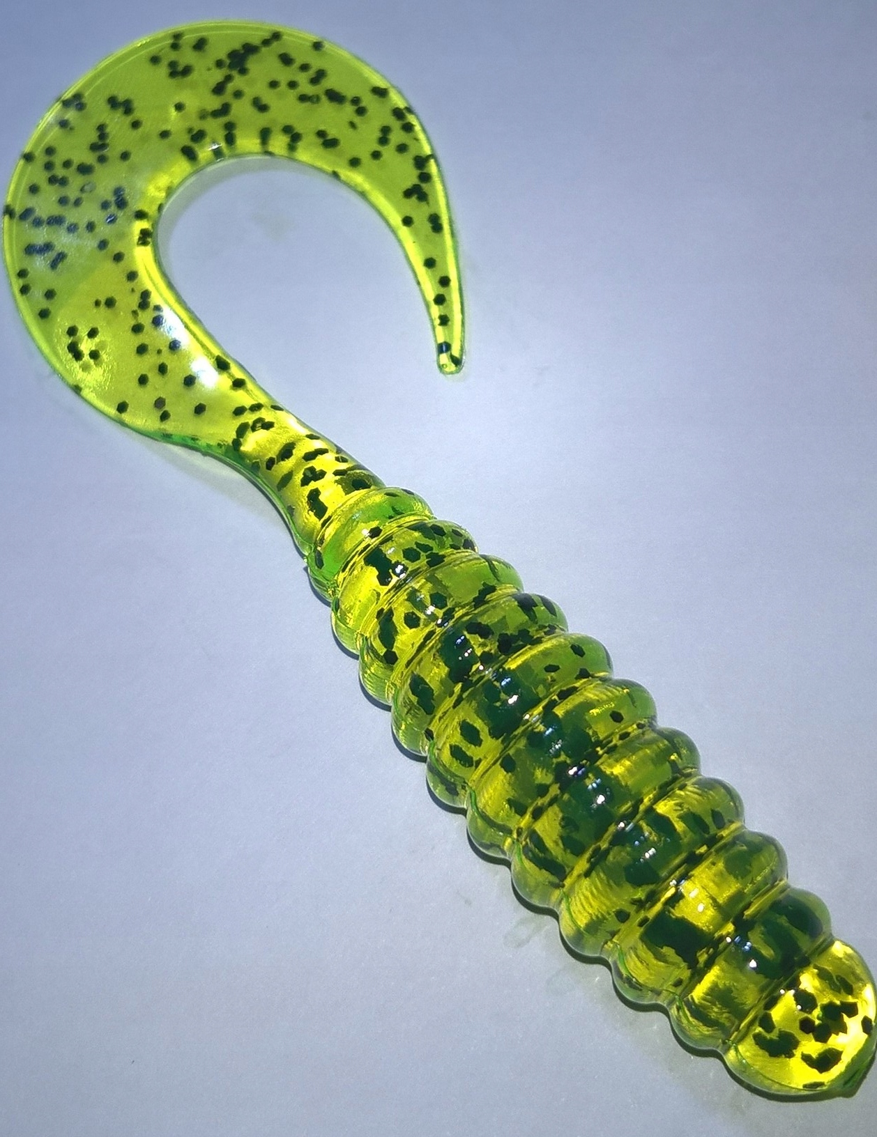 Manns Twister 5,5cm Przeźr. żółty fluo czarny brok