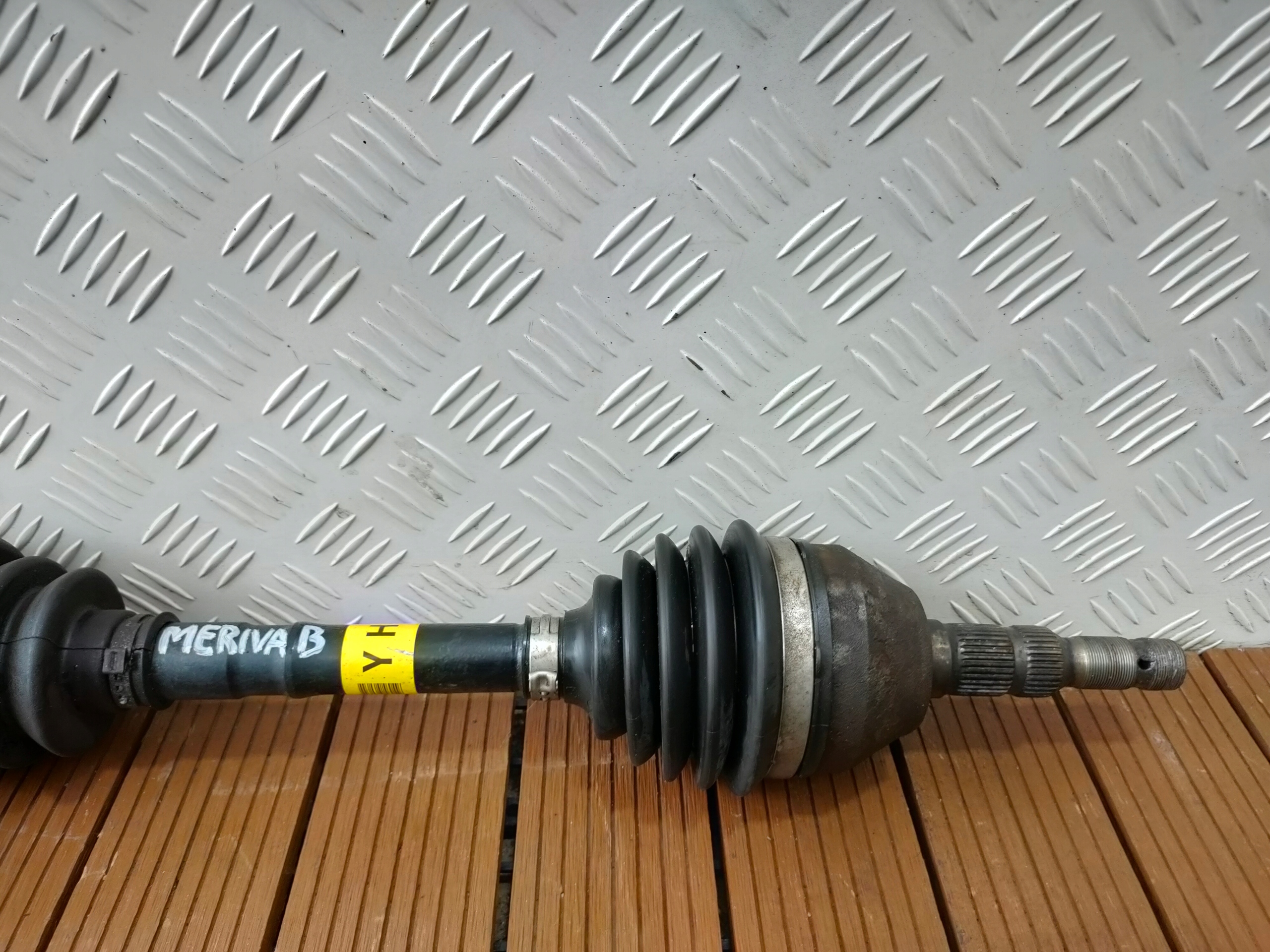 OPEL MERIVA B 10-17 1.4T semi-axis front left short. OE SYMBOL YH