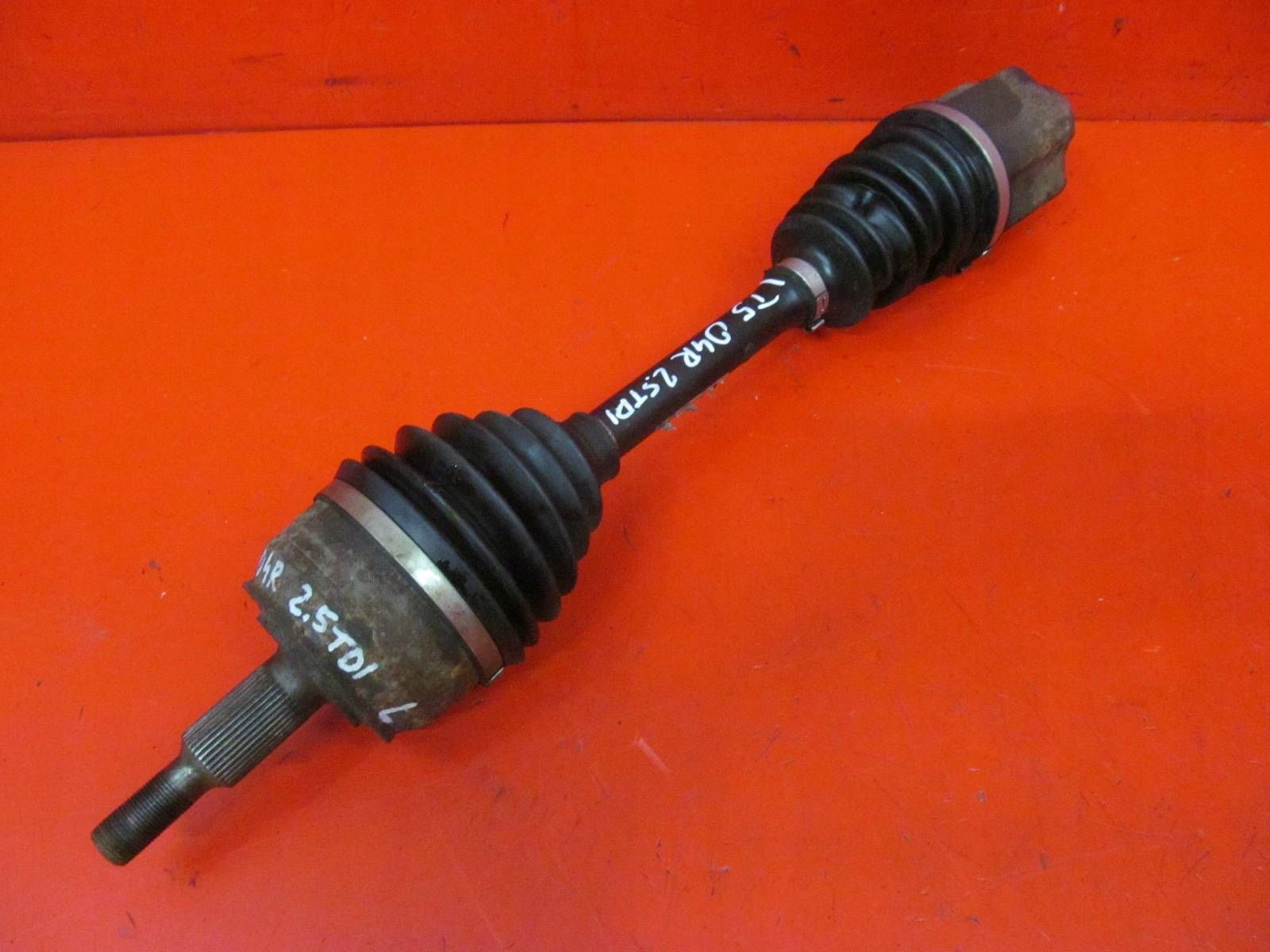 VW TRANSPORTER T5 7H 2.5 TDI AXD semi-axis left front short. 7E0407271AG