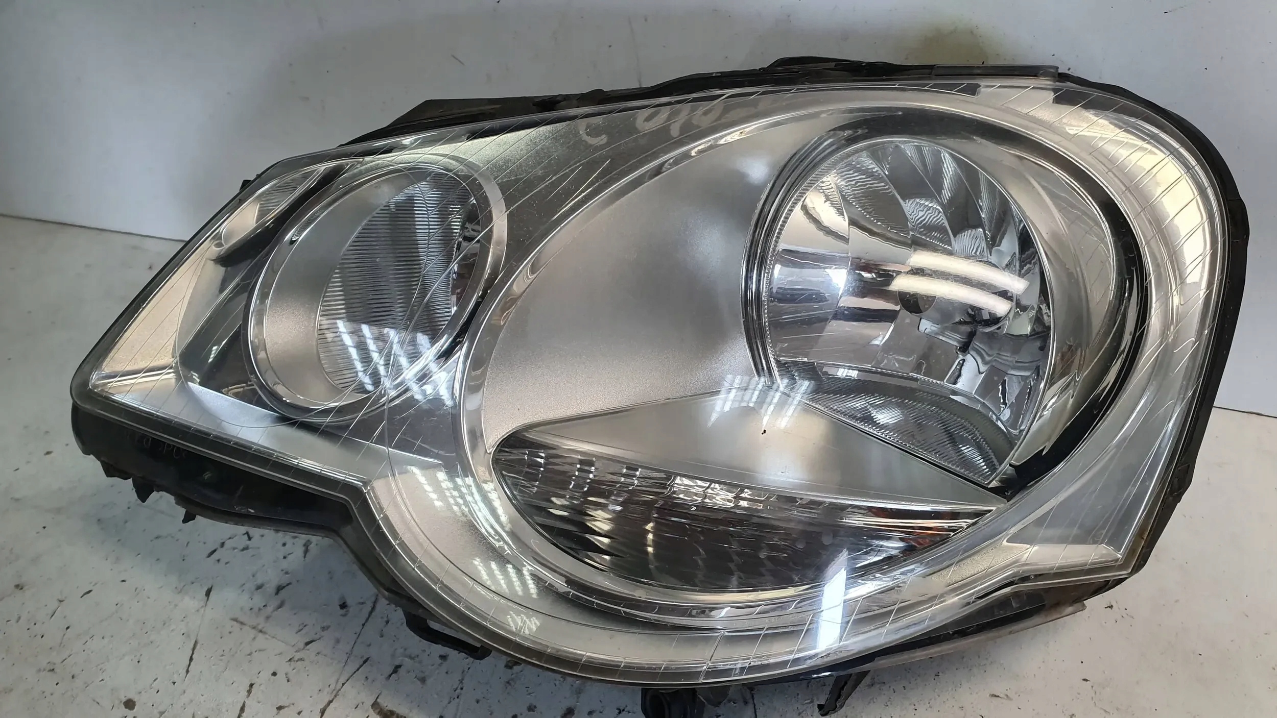 light front left 89311999 VW POLO 6Q LIFT 05