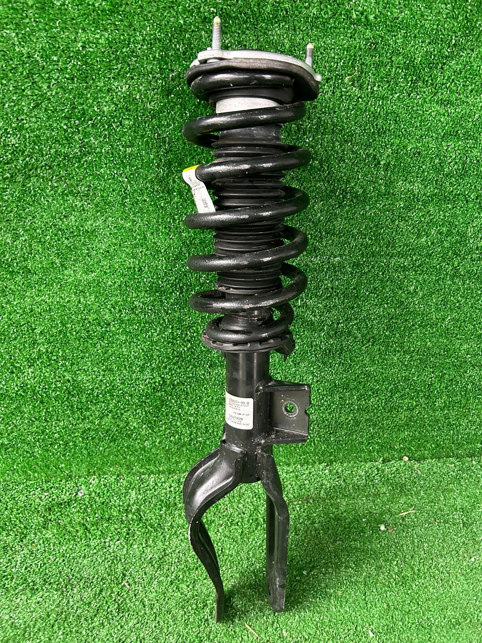 Tesla Y shock absorber front front left 2020- 1288371-99-B