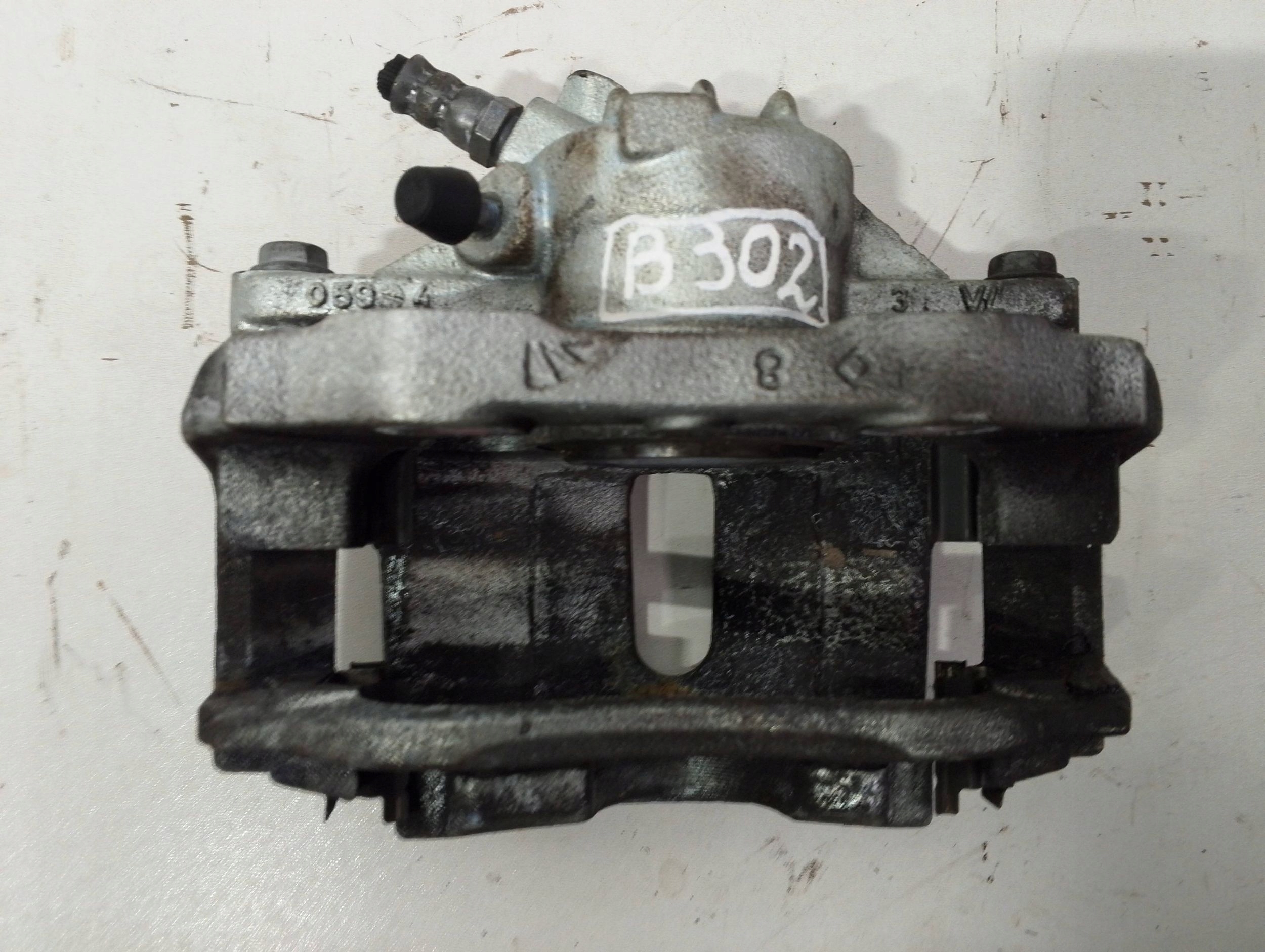 Opel Corsa F caliper front left L94124 (B302)