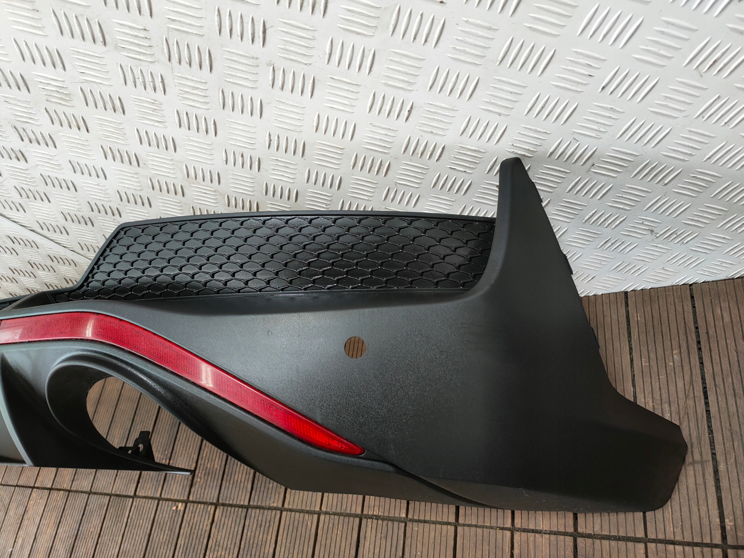HYUNDAI I30N 16-23 FASTBACK diffuser of a bumper TRZECI STOP light 86612-S0700