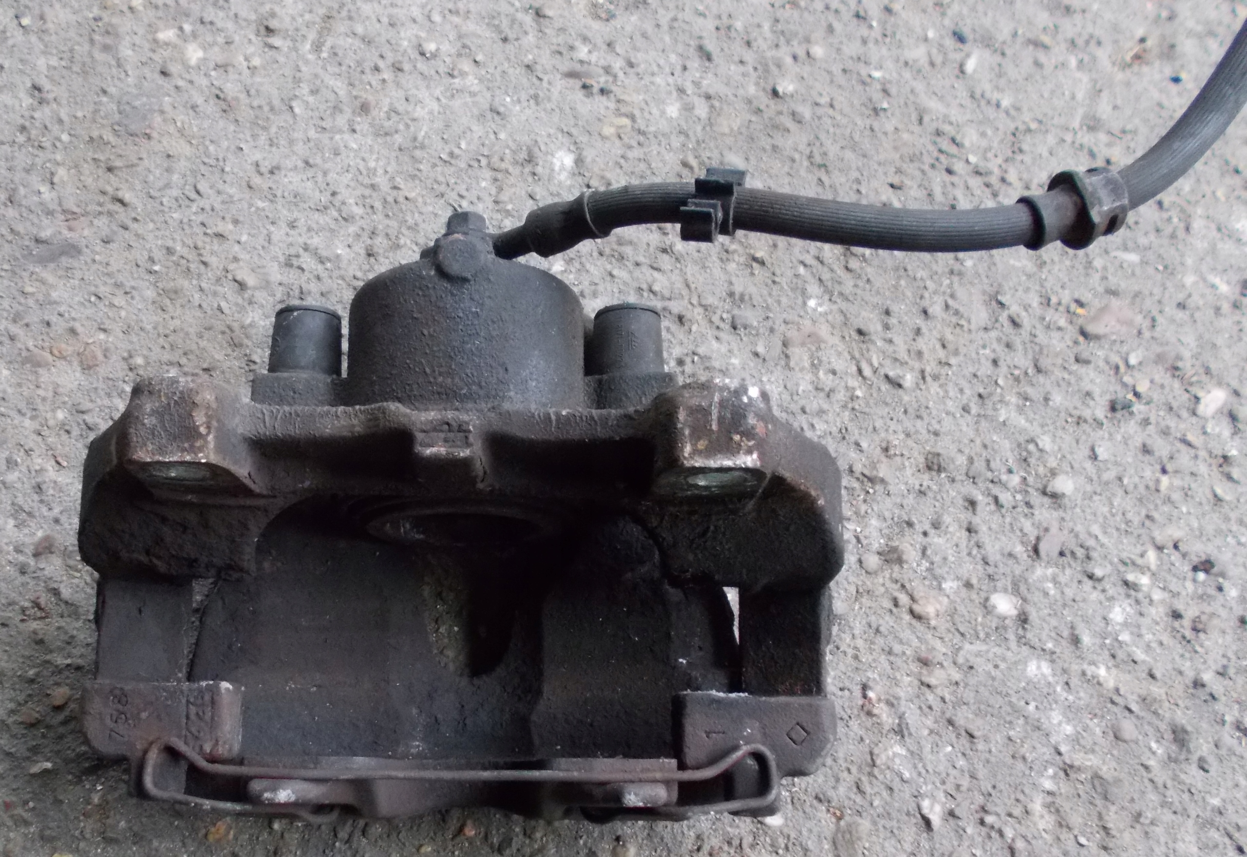 OPEL ASTRA H KOMBI 1.9 CDTI 09R caliper brake right front