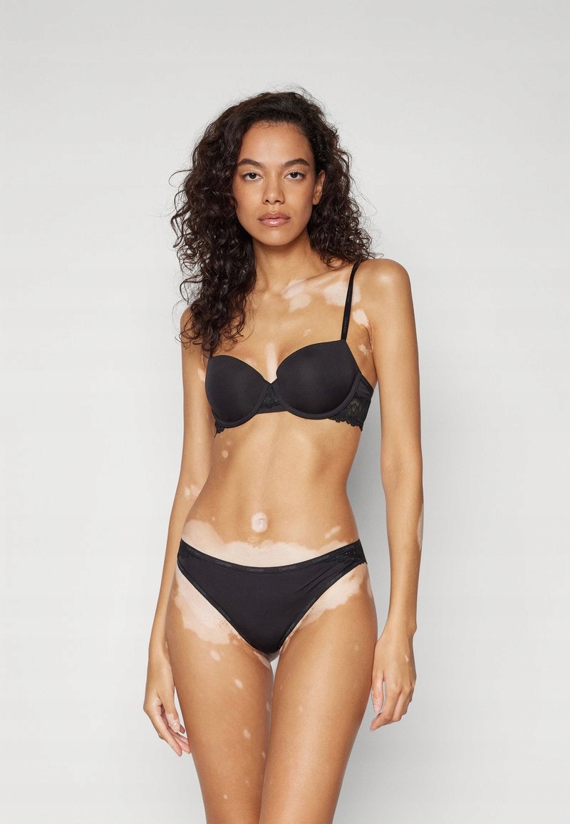 Černá podprsenka s krajkou a kosticemi Calvin Klein 75C