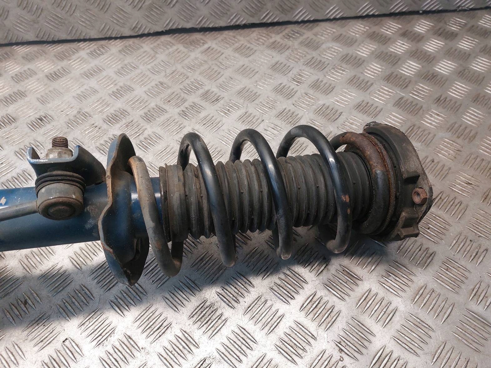 shock absorber spring swing left front VW GOLF V GTI 1266230055