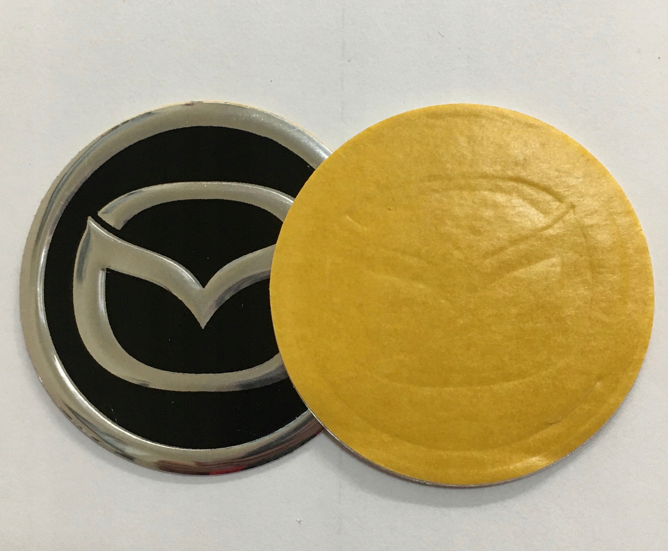 

Emblematy Na Kołpaki 3D Mazda 60mm ( Zamiennik)