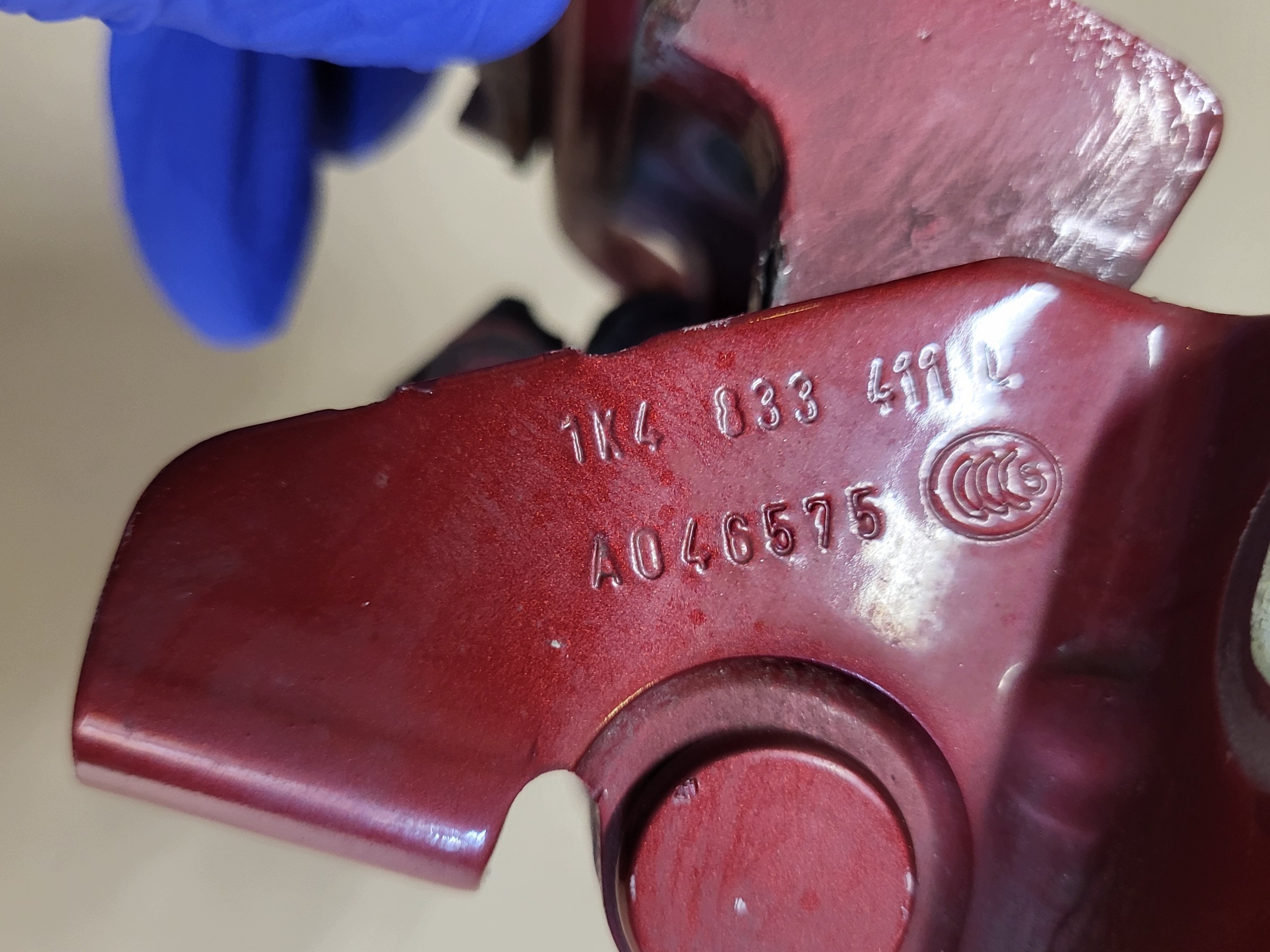 hinge door left rear part lower DOL VW GOLF V 1K4833411L red / claret