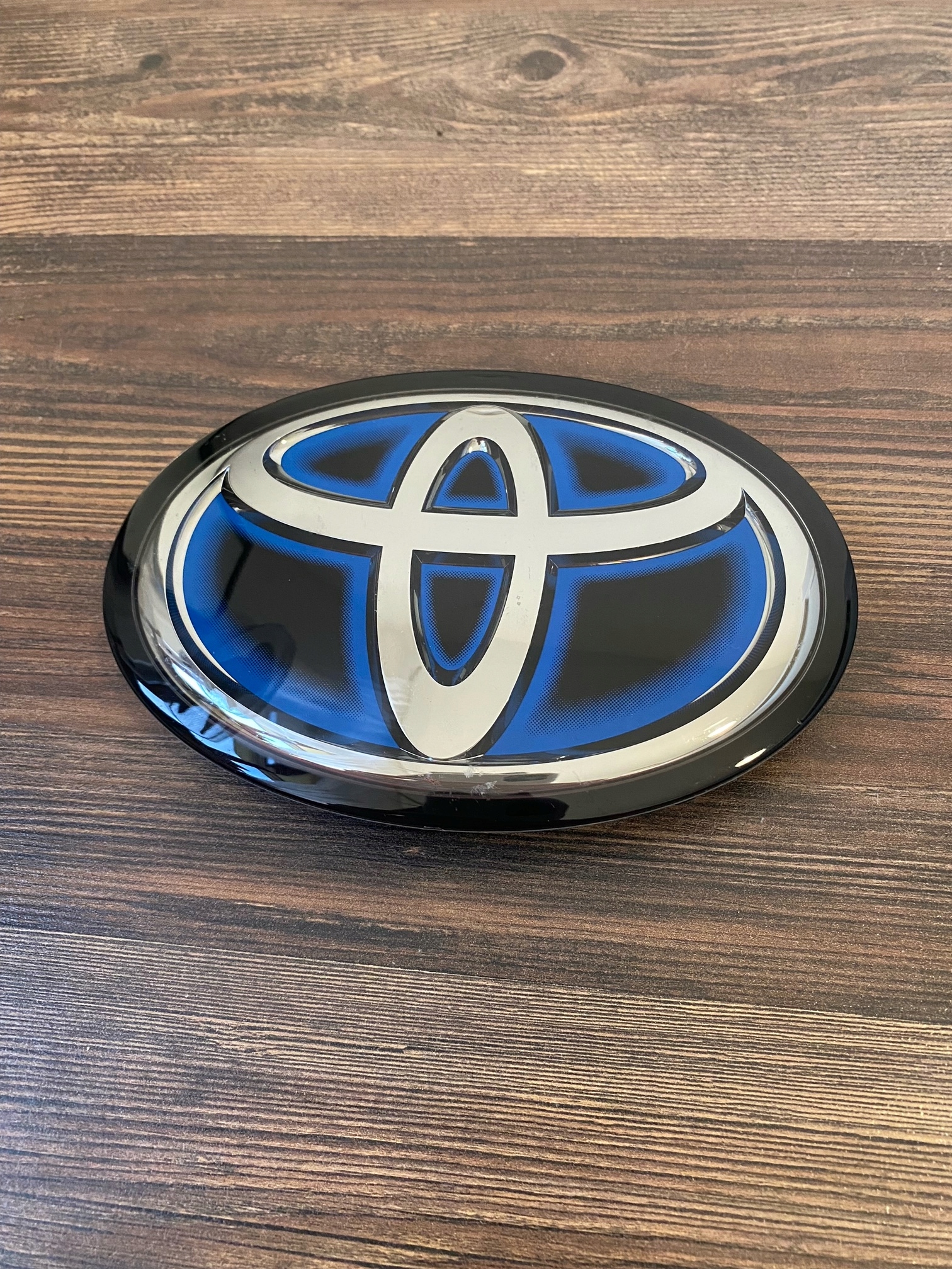 Toyota Corolla E21 XII Hybrid Emblemat Oryginał 90975-02136