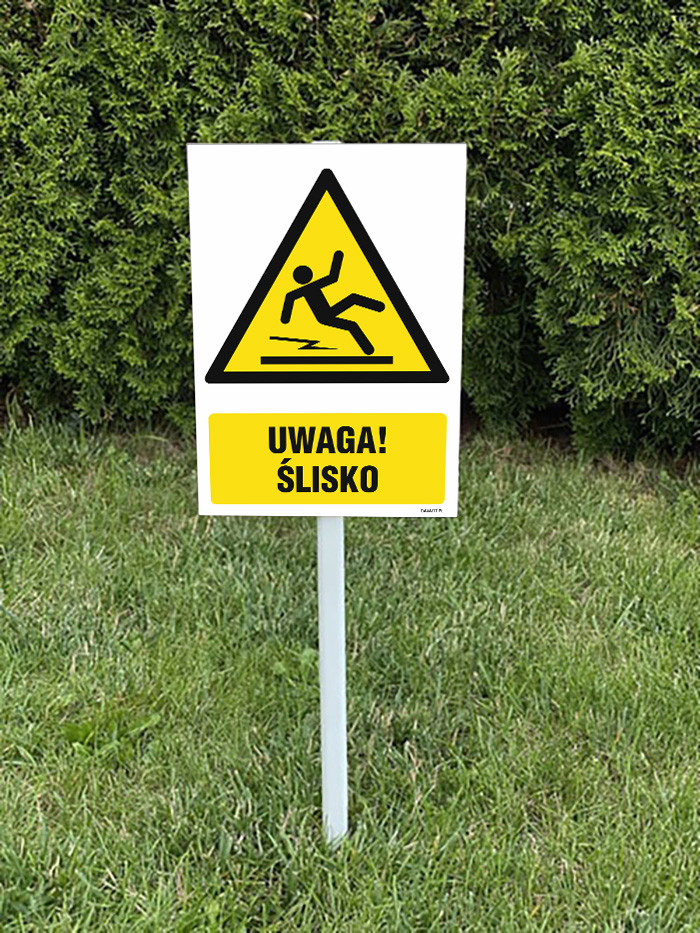 Uwaga! Ślisko - tabliczka na trawnik
