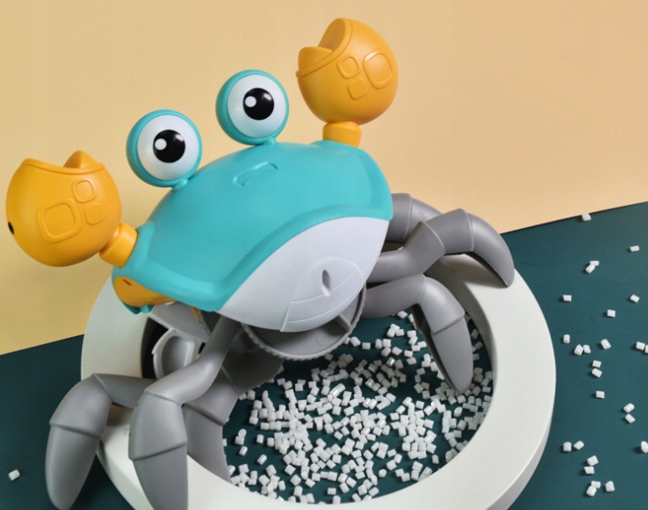 Zabawka INTERAKTYWNA UCIEKAJĄCY PEŁZAJĄCY KRAB DŹWIĘK MUZYKA CZUJNIKI RUCHU Wysokość produktu 13 cm