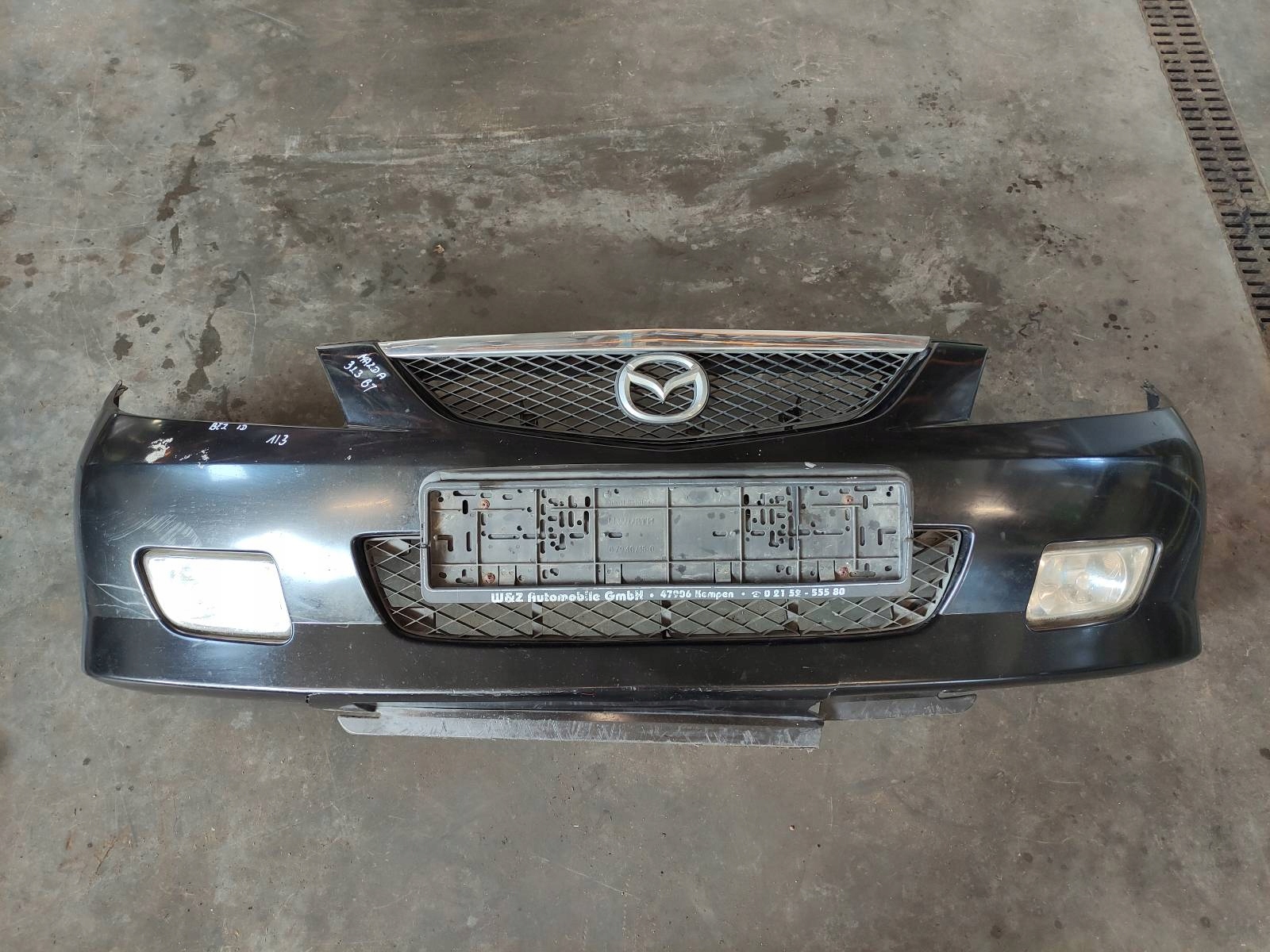 Stoßstange + Leuchte MAZDA 323 BJ
