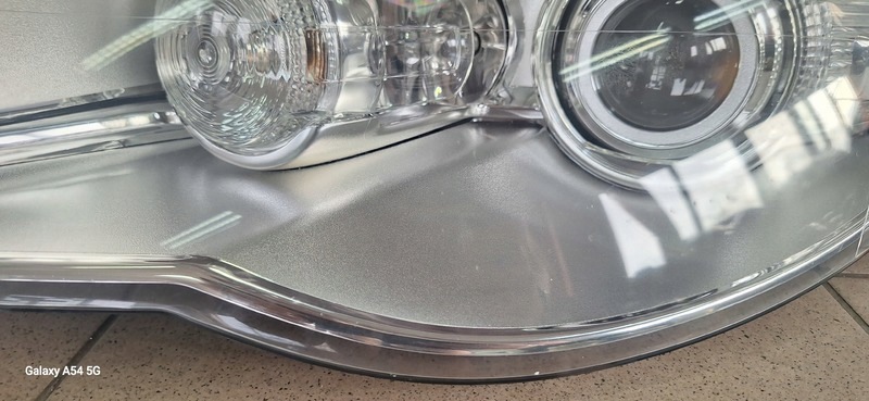 REFLEKTOR light front left VW TOUAREG BI-XENON 7L6941031C