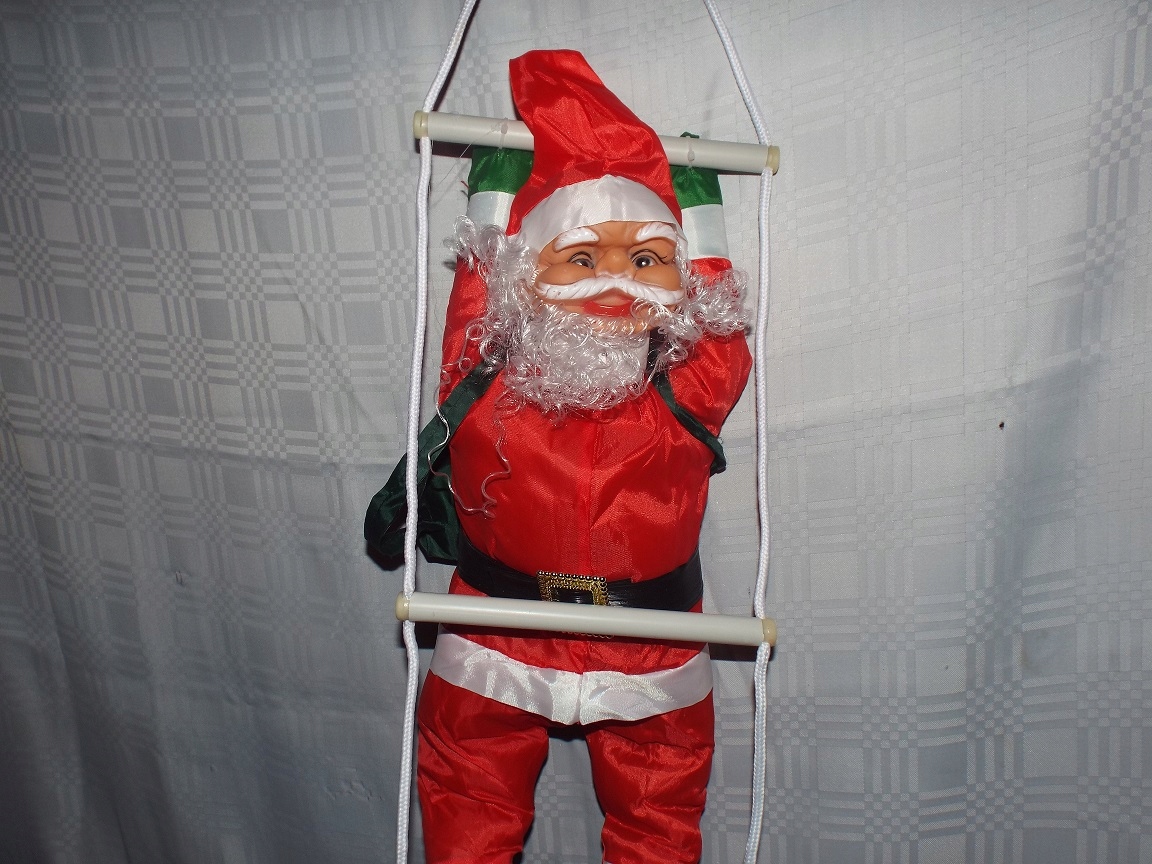 

Mikołaj Wspinający Się Po Drabinie 45cm Ozdoba