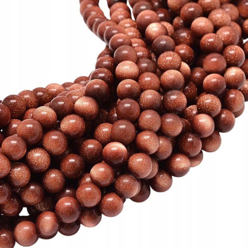 GST13 Noc Kairu koraliki Goldstone kule 8mm 5szt
