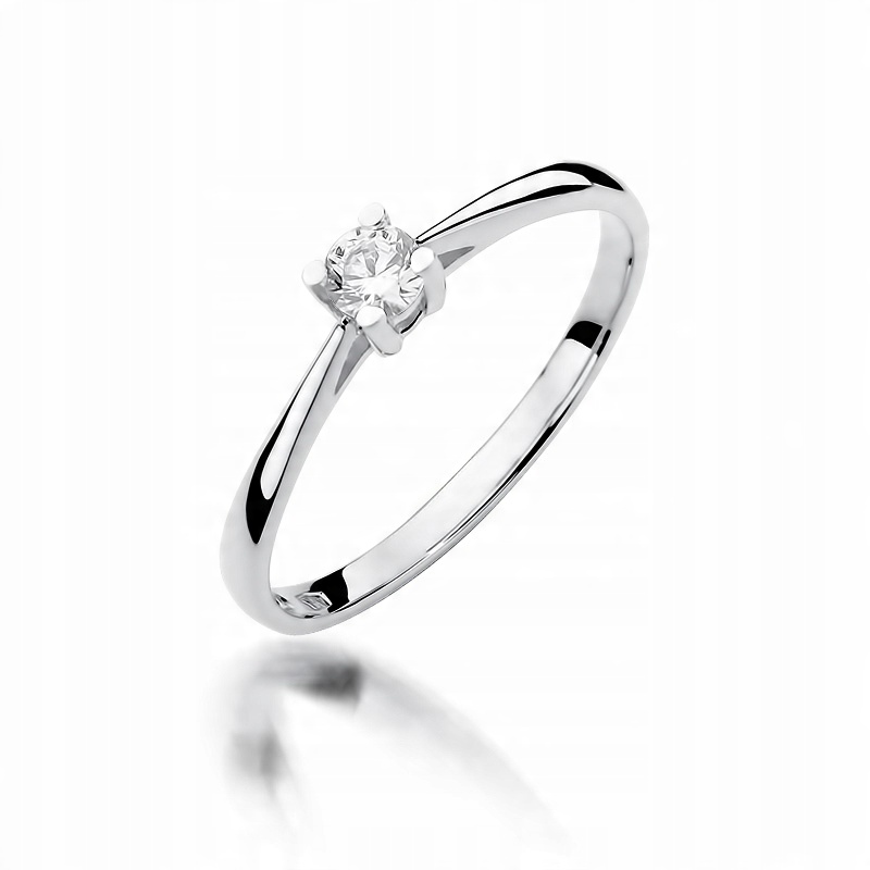 

Śliczny pierścionek brylant 0,15 Ct białe złoto