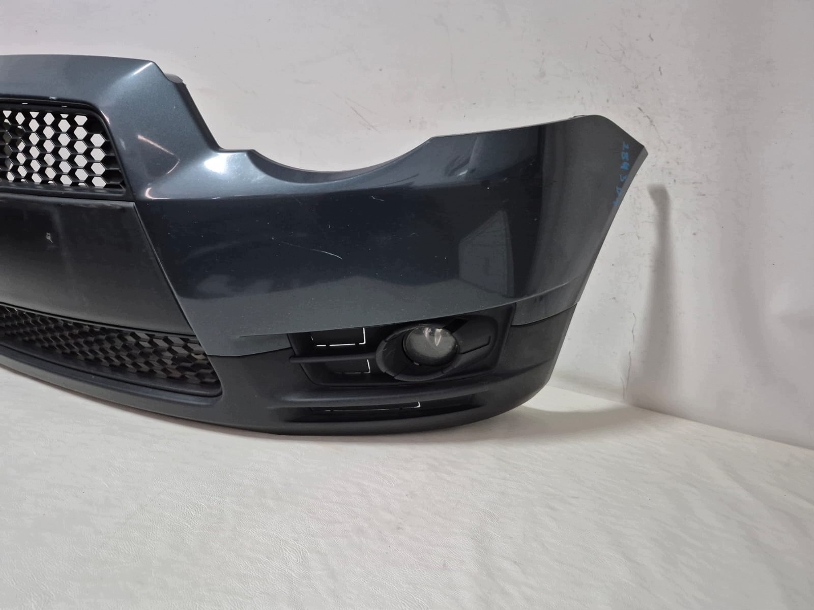 MITSUBISHI COLT 6 VI LIFT 08- bumper front front complete of wheels.56A