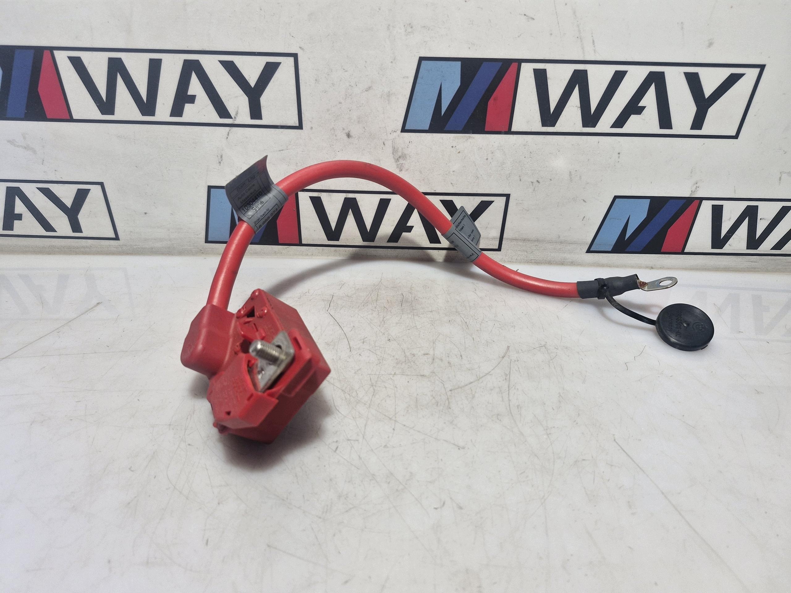 6988974 BMW E84 E90 E91 E92 borne positif PIROTECHNICZNA original