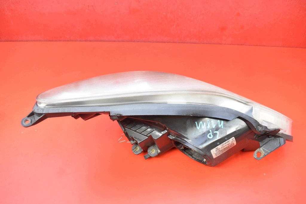 REFLEKTOR left light front EU 13186381 OPEL CORSA D 06-11