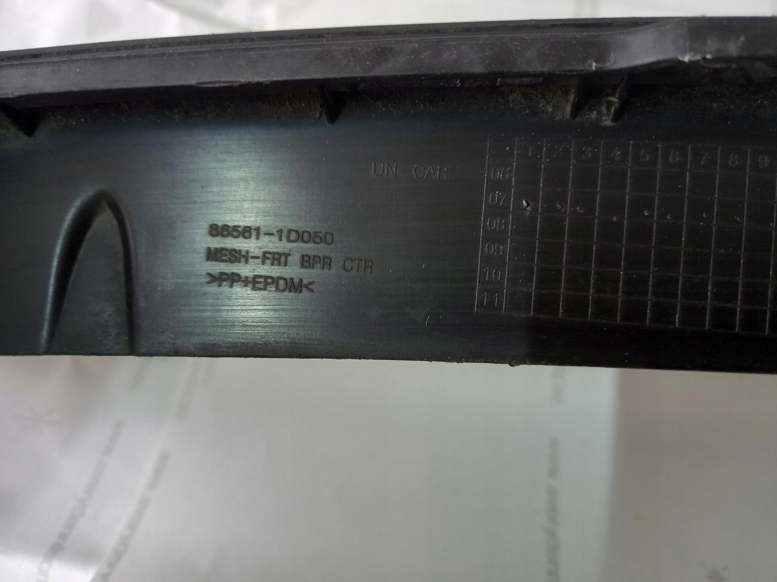 grid of a bumper front KIA CARENS III 06-13