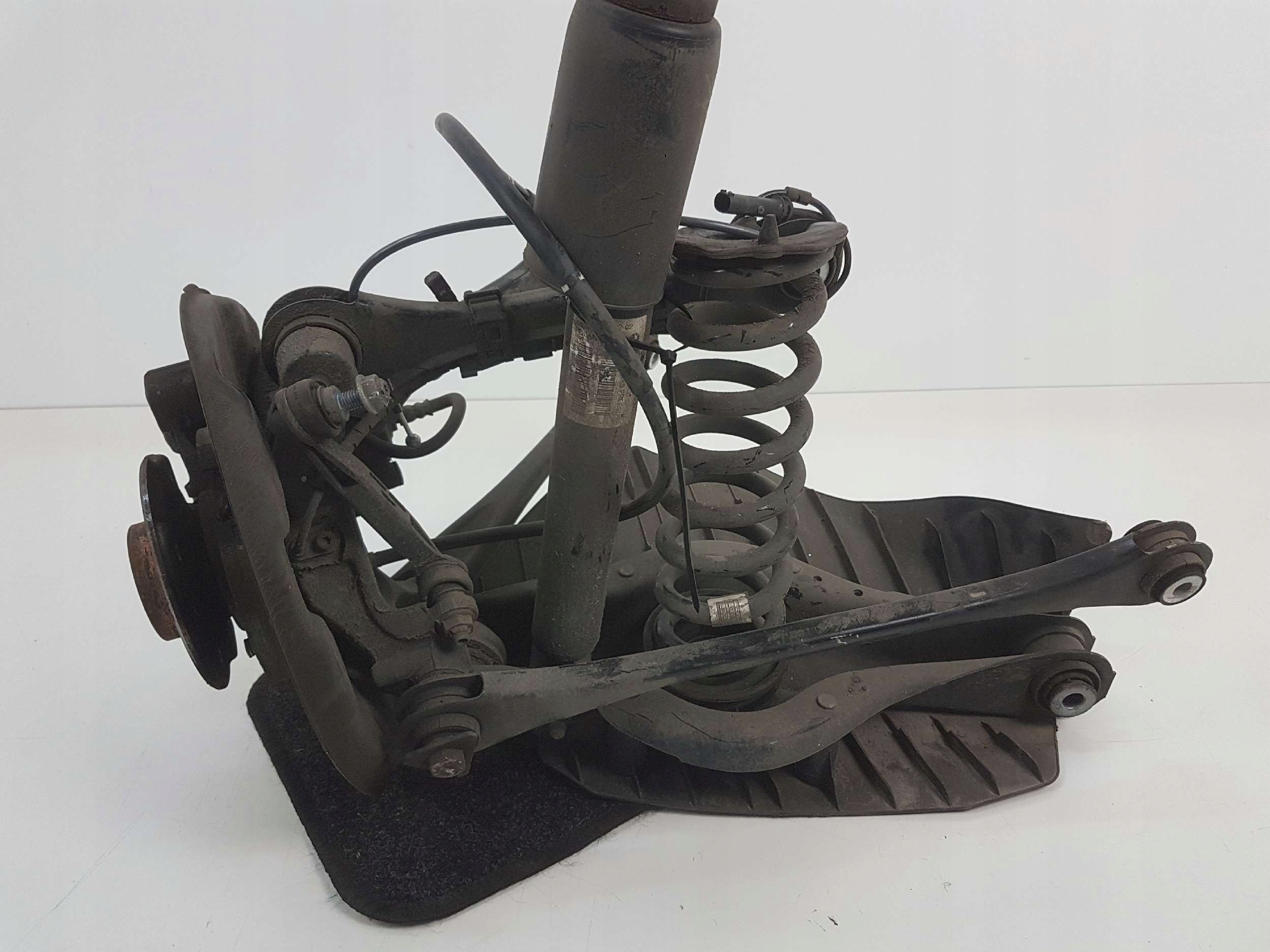 BMW F30 LCI 2.0D swing shock absorber left rear part