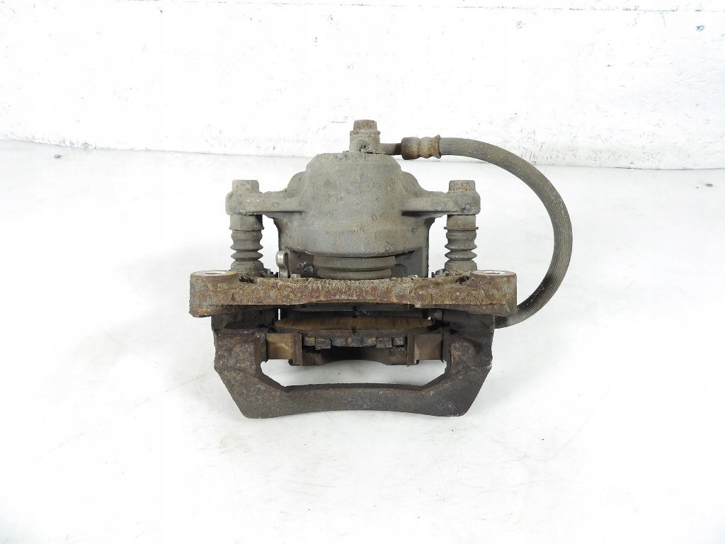 SUBARU LEGACY V 2.0D caliper brake rear part left