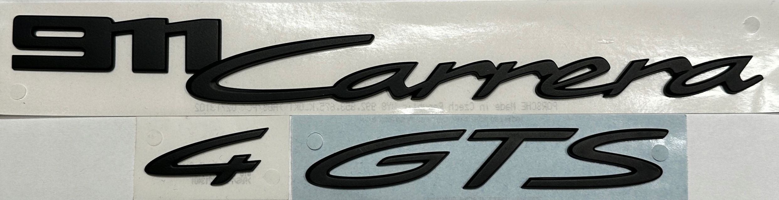 Porsche 911 992 "911 Carrera 4 Gts" Oe emblém znak nápis čierna matná
