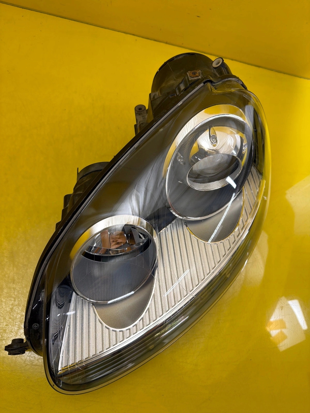 light left front VW Golf V Xenon 1K6941039
