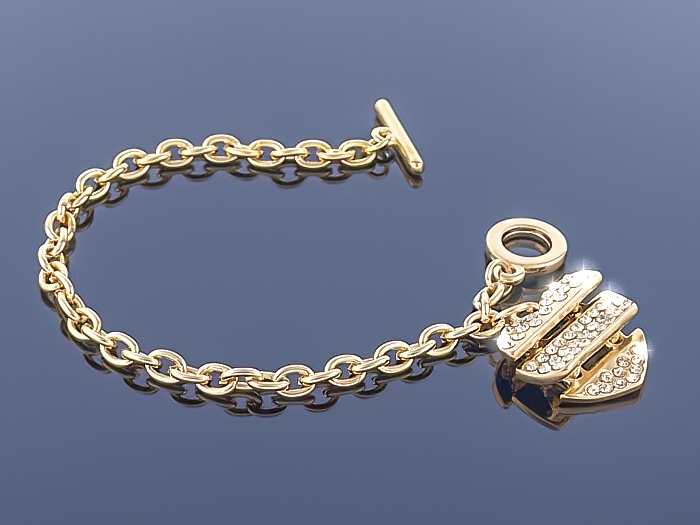 

Złota bransoletka Charms