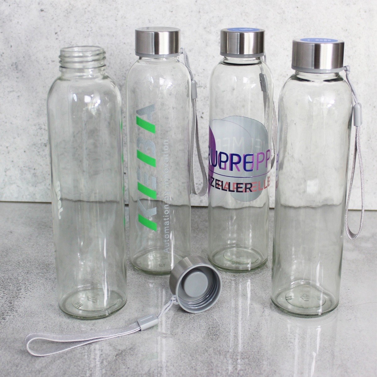 BUTELKA SZKLANA 500ML NA WODĘ PASEK PRZEZROCZYSTA Marka inna