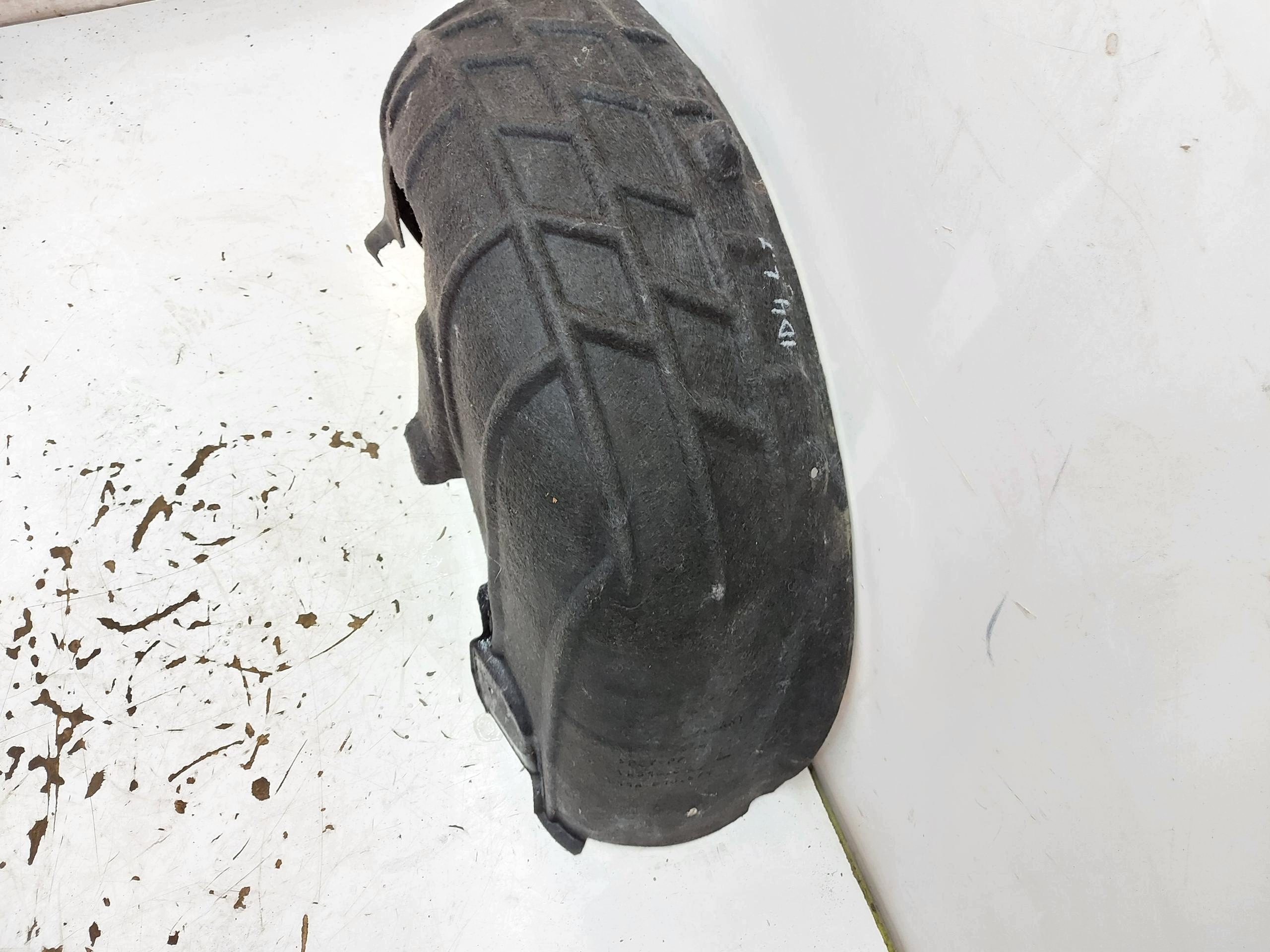 VW ID4 11A , 2024r SUV 5D mudguard rear part left