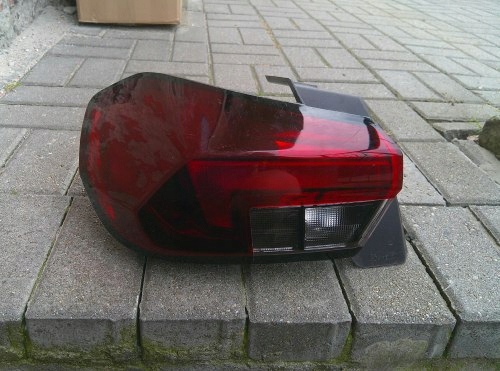 OPEL CORSA F 19+ LEWA TYLNA LAMPA ZWYKŁA ORYGINAŁ