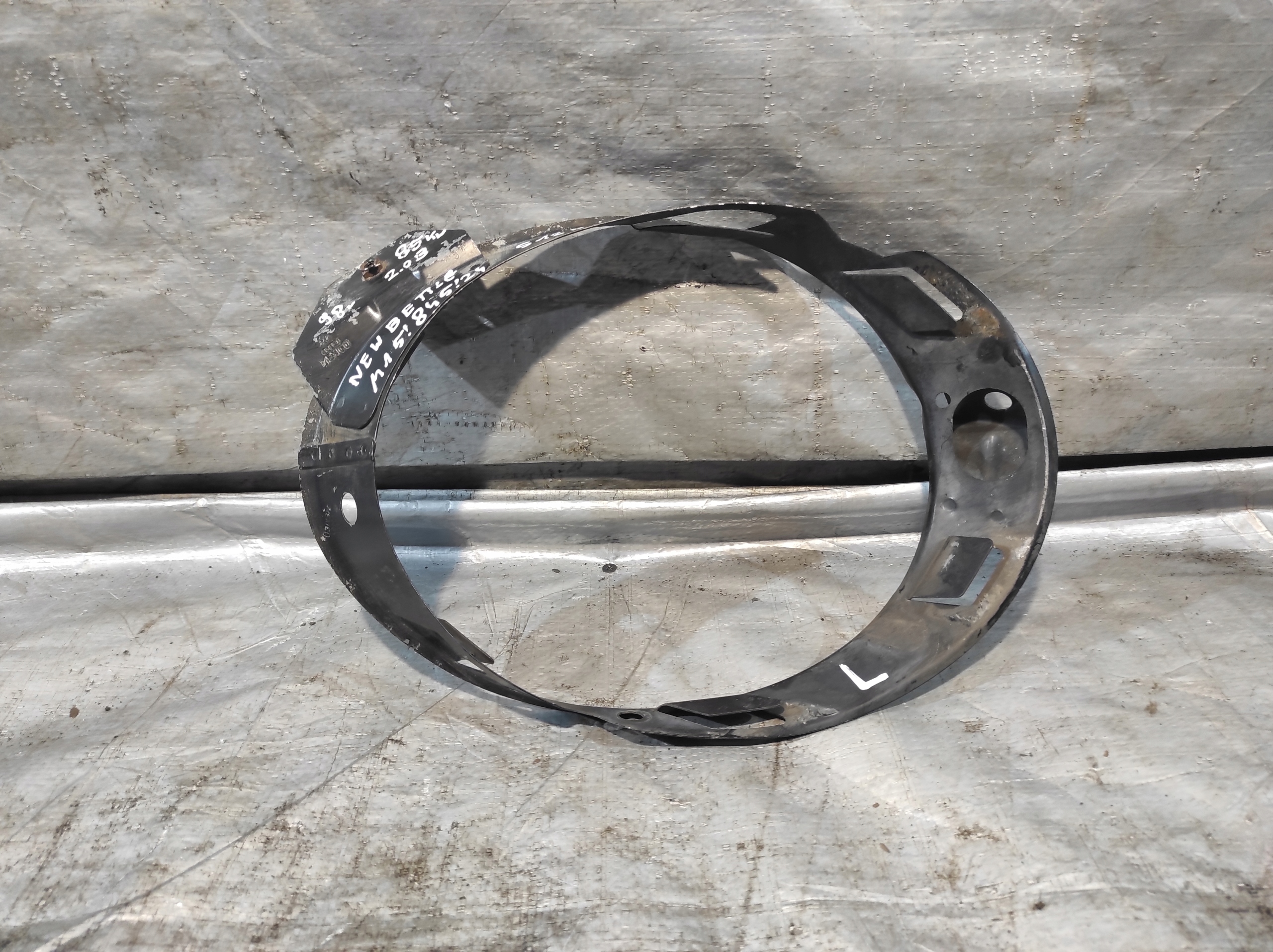 frame holder cover REFLEKTORA lights left front VW NEW BEETLE