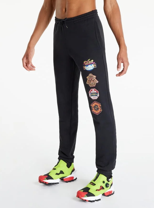 Reebok Pánské Tepláky Černé S Potiskem M 0A8C5_A* Pozadí