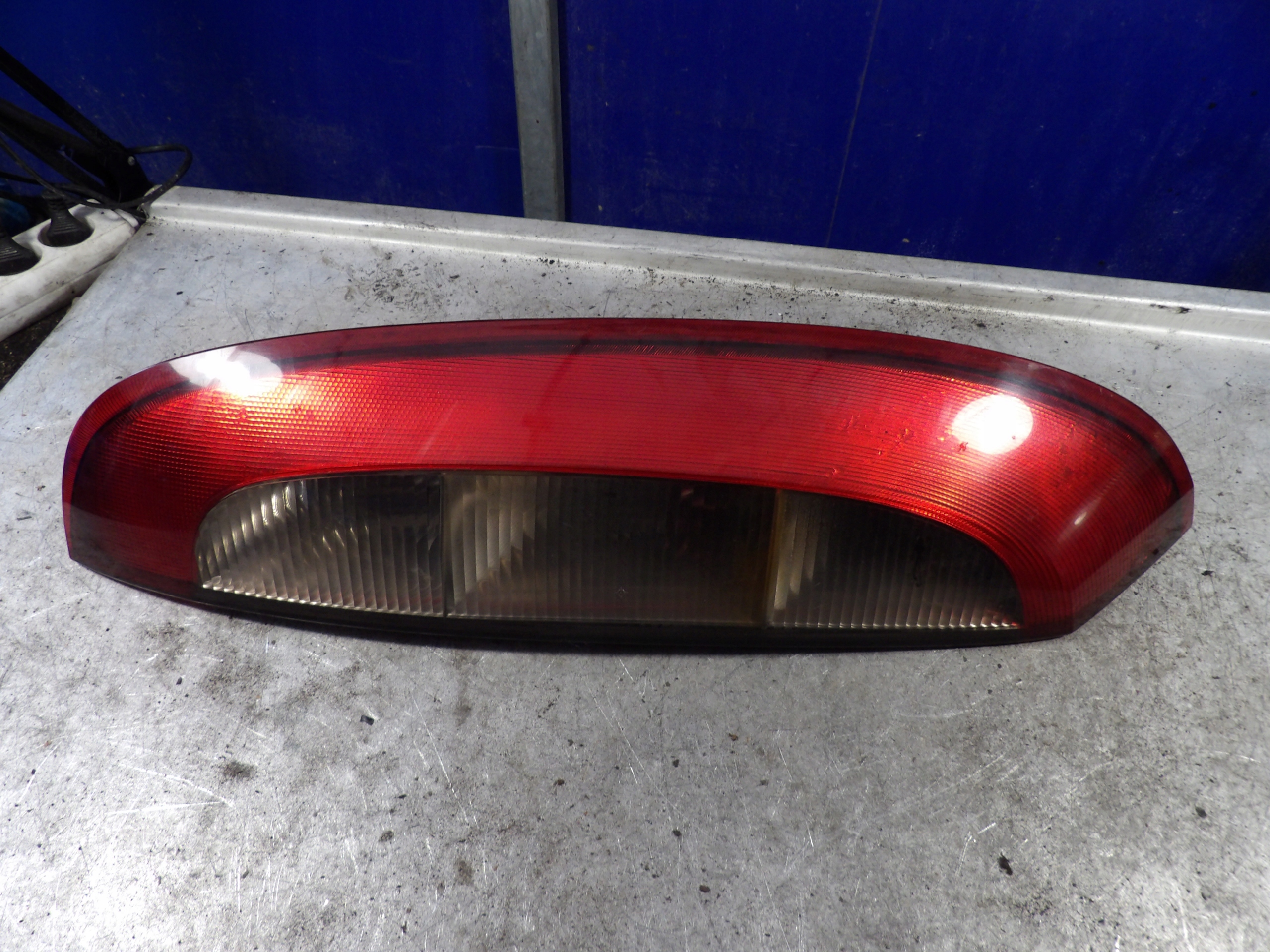 Opel Corsa C light rear left 1,2B 09114336 89302171