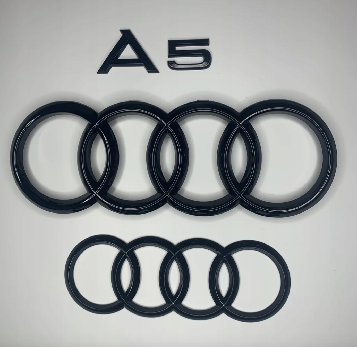 Czarne emblematy Audi A5 ringi przód i tył + A5 B9
