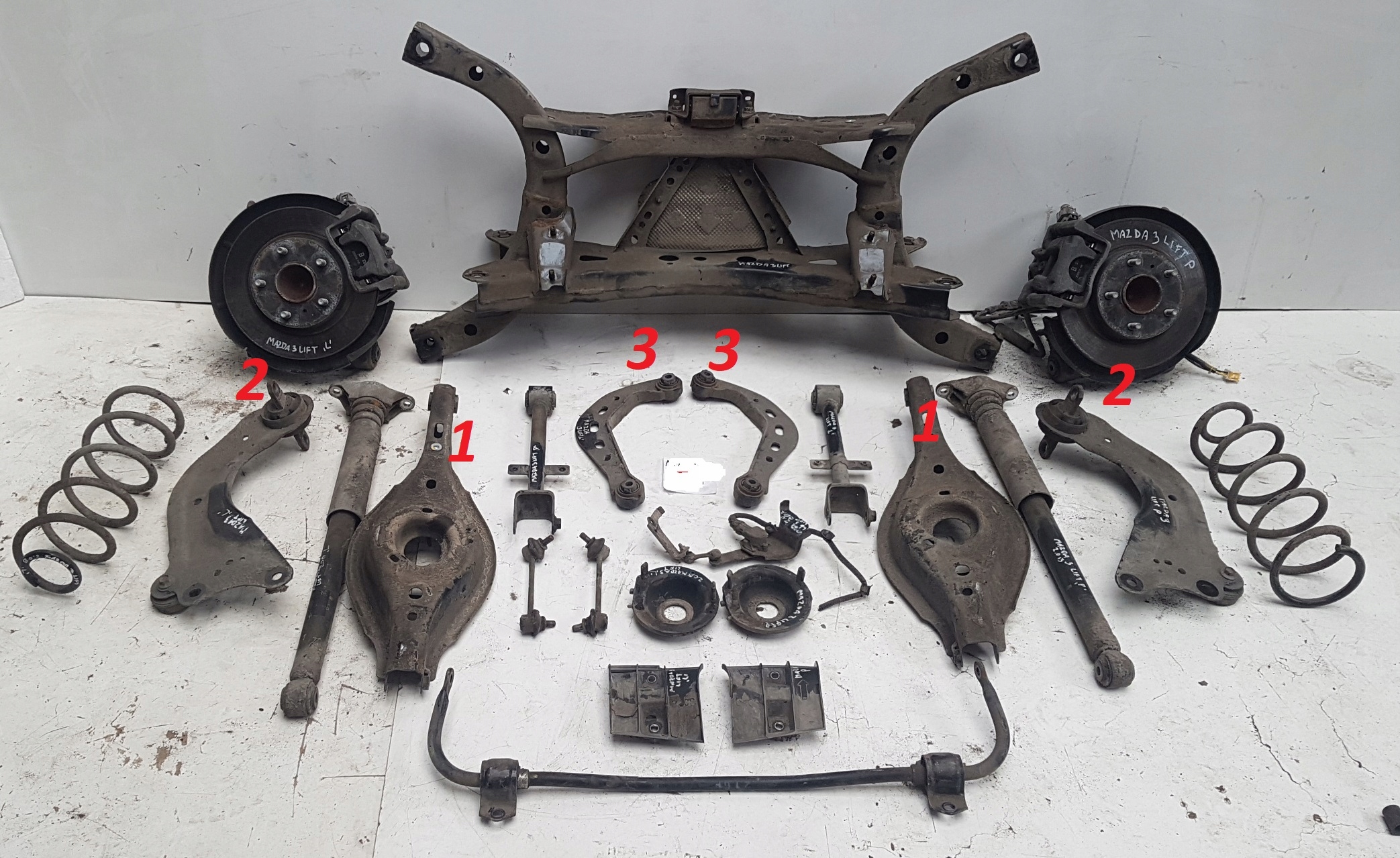 Подвеска мазда 3 бк. Подвеска Мазда 3 БМ. Передняя ходовая Мазда 3 БК. Комплект передней подвески Мазда 3 БК.