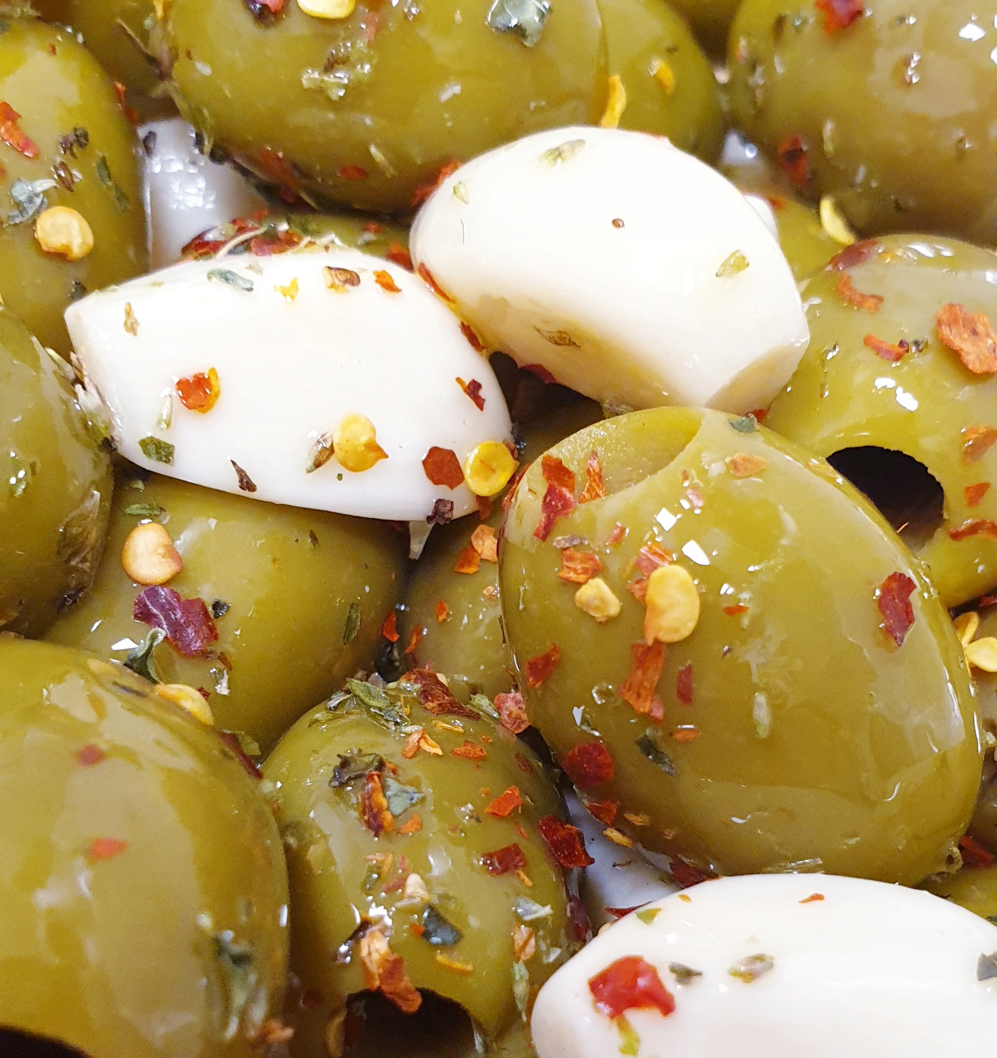 

Oliwki Zielone dryl. z czosnkiem pikantne 250 gr