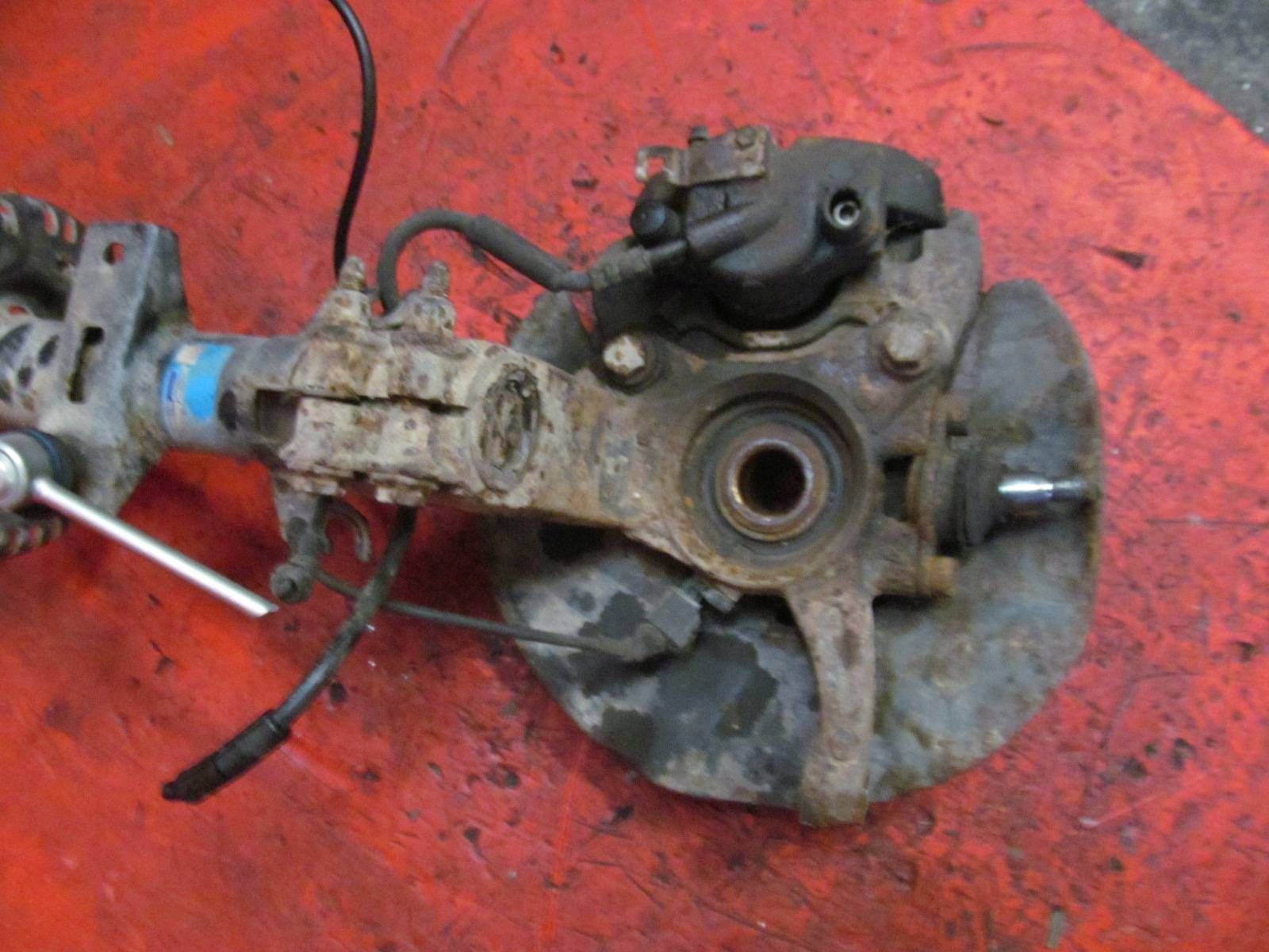 VW TRANSPORTER T5 7H 2.5 TDI AXD swing shock absorber left front KOMPLET