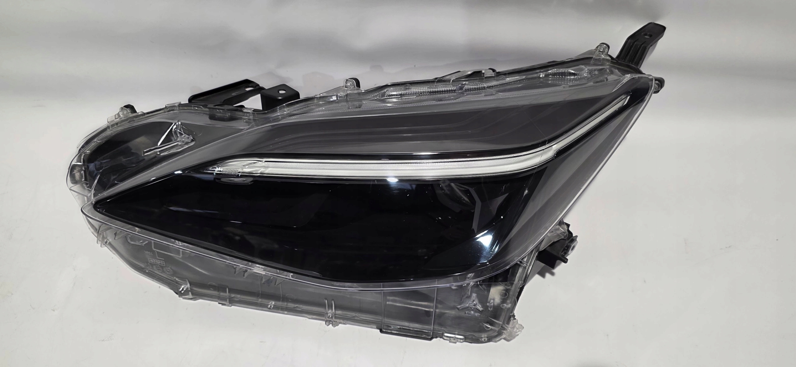 light left front lens LED TOYOTA YARIS CROSS 20- original E