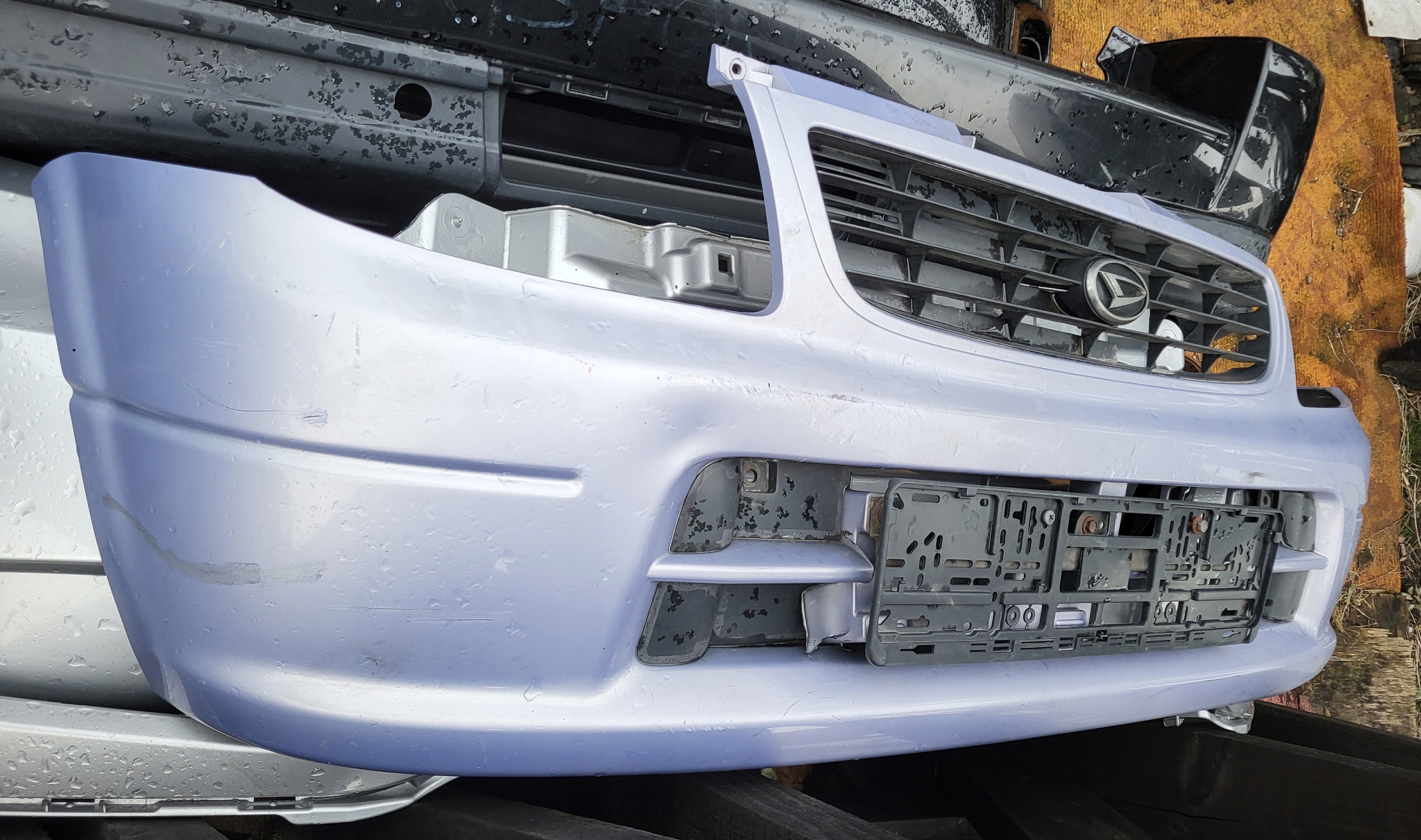 front bumper front PREKLADgrill DAIHATSU CUORE V OE EU
