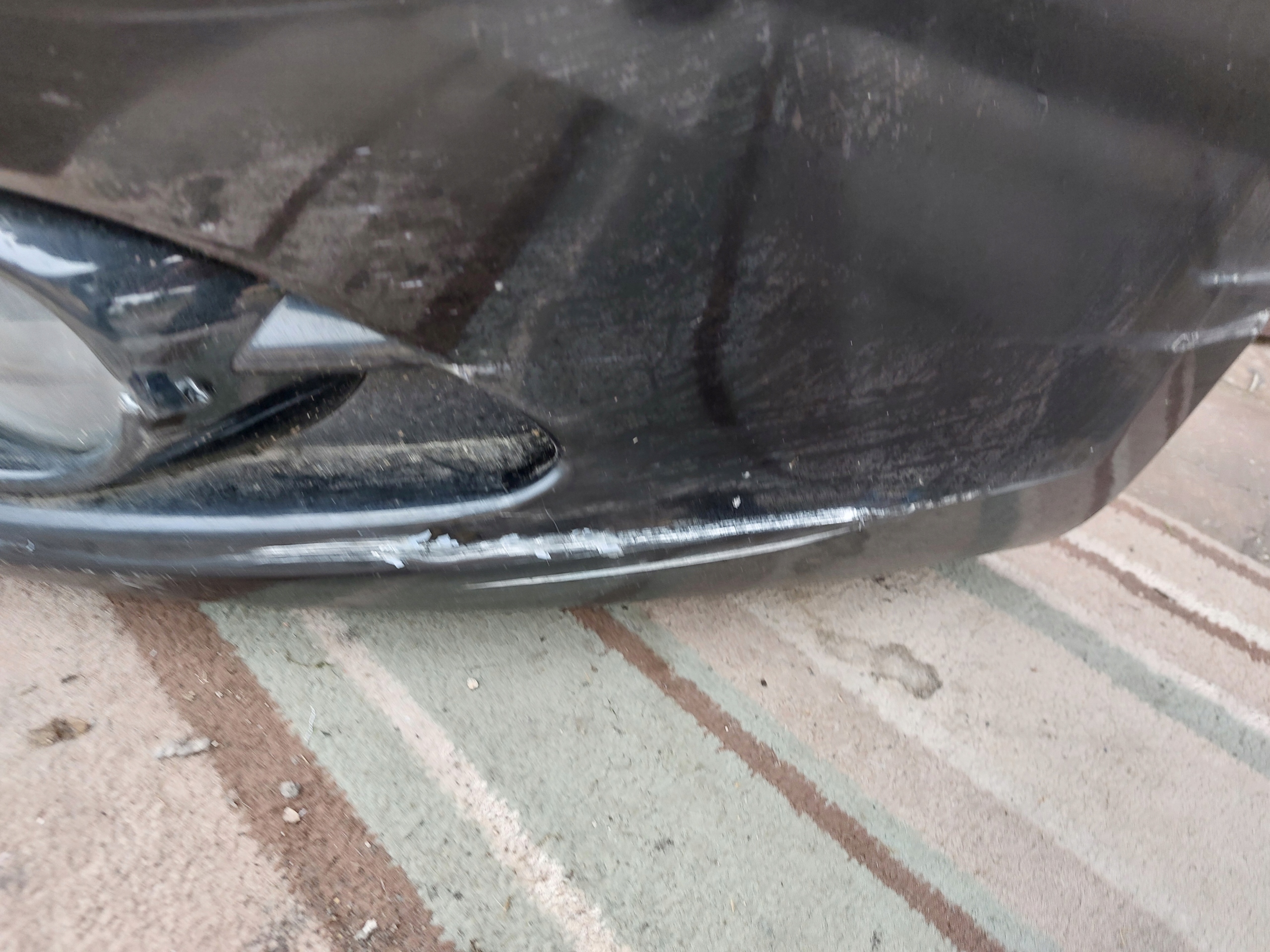 bumper front VW EOS 08r washers complete black