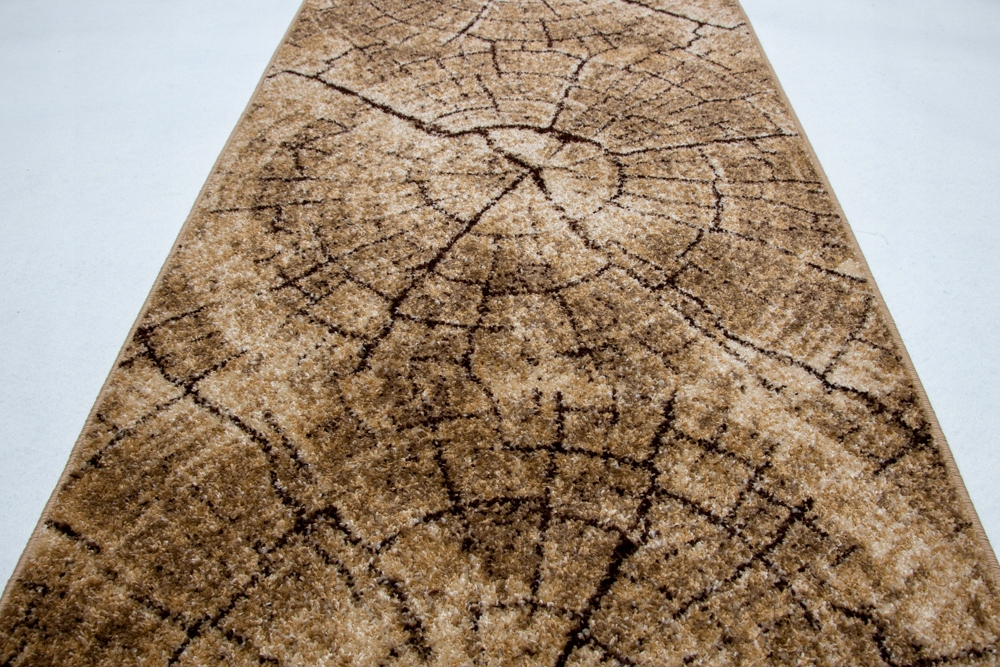 

Chodnik Na Wymiar Pień beżowy 60cm obszycie