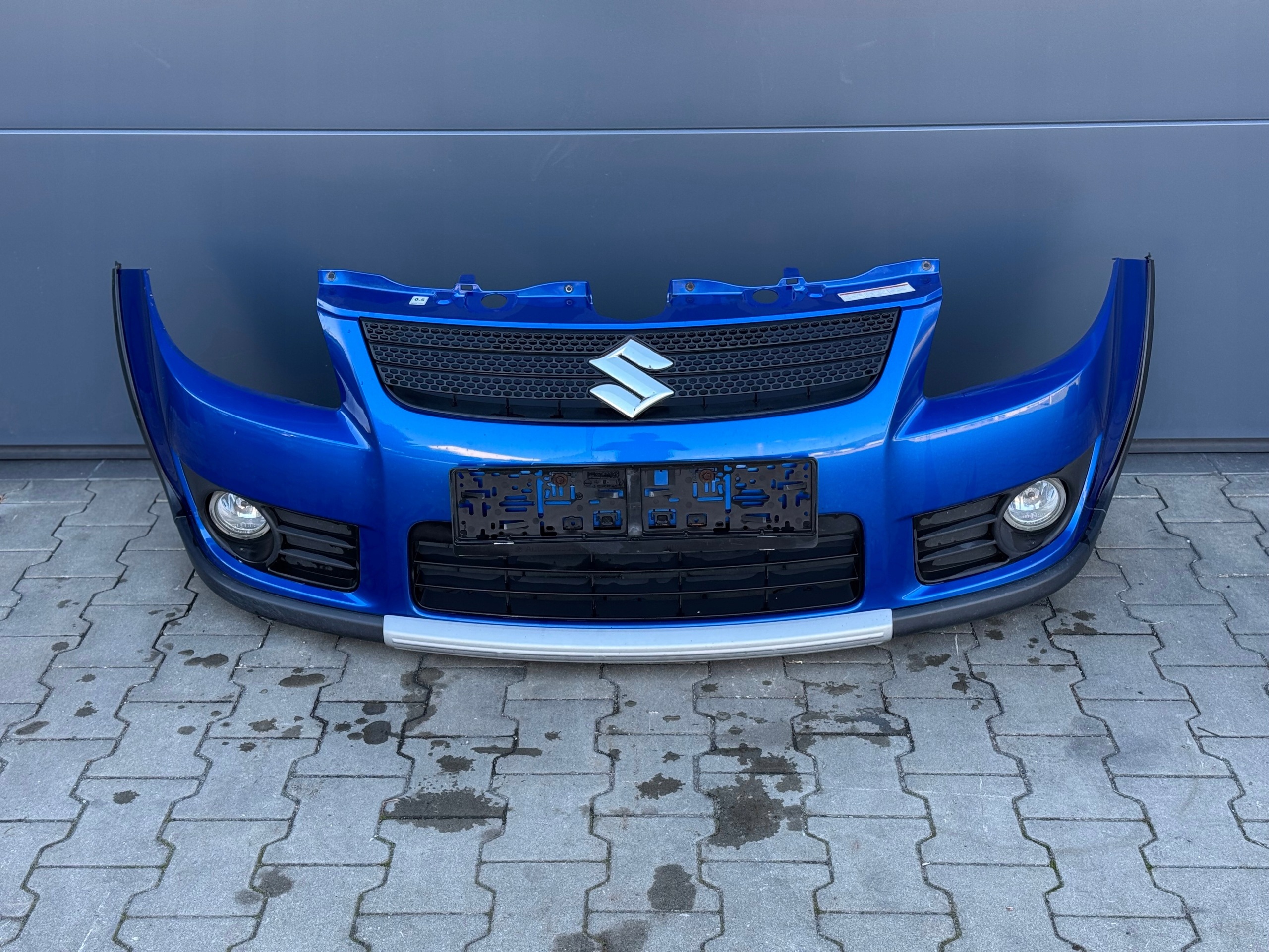 SUZUKI SX4 06R- bumper front front SX4 SX-4 original blue !