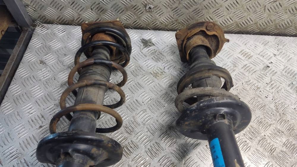 shock absorber swing left right rear part MAZDA 323F BA