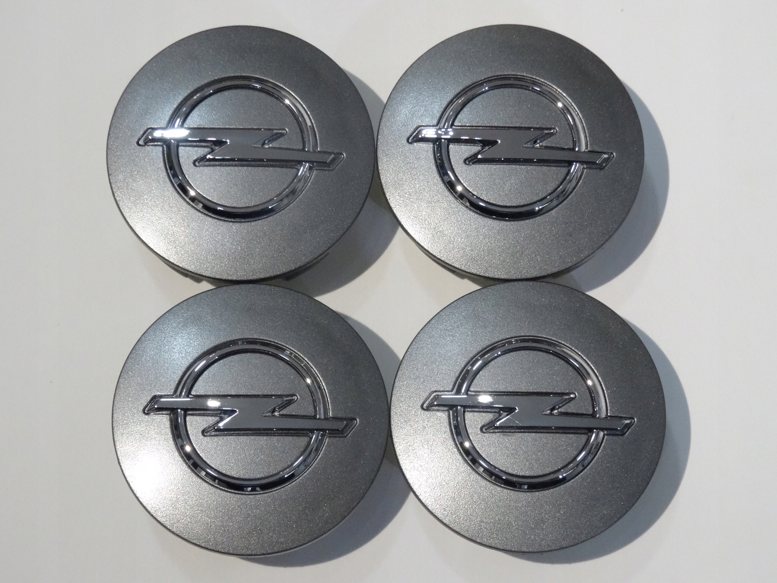 

4x Dekielki Dekle na felgi Opel 54 mm 3D szare