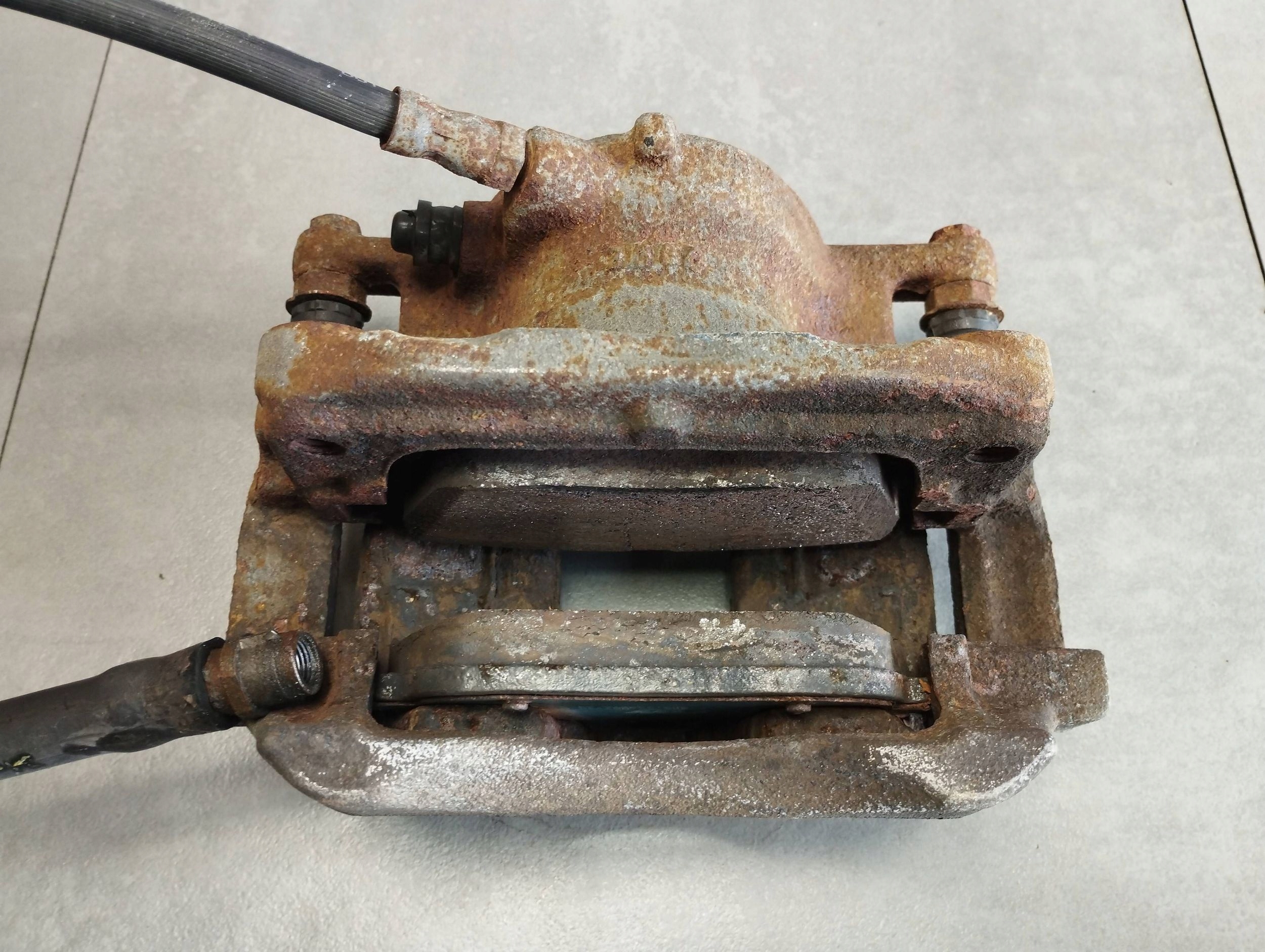 Mercedes-Benz B W246 W242 caliper left front A24638