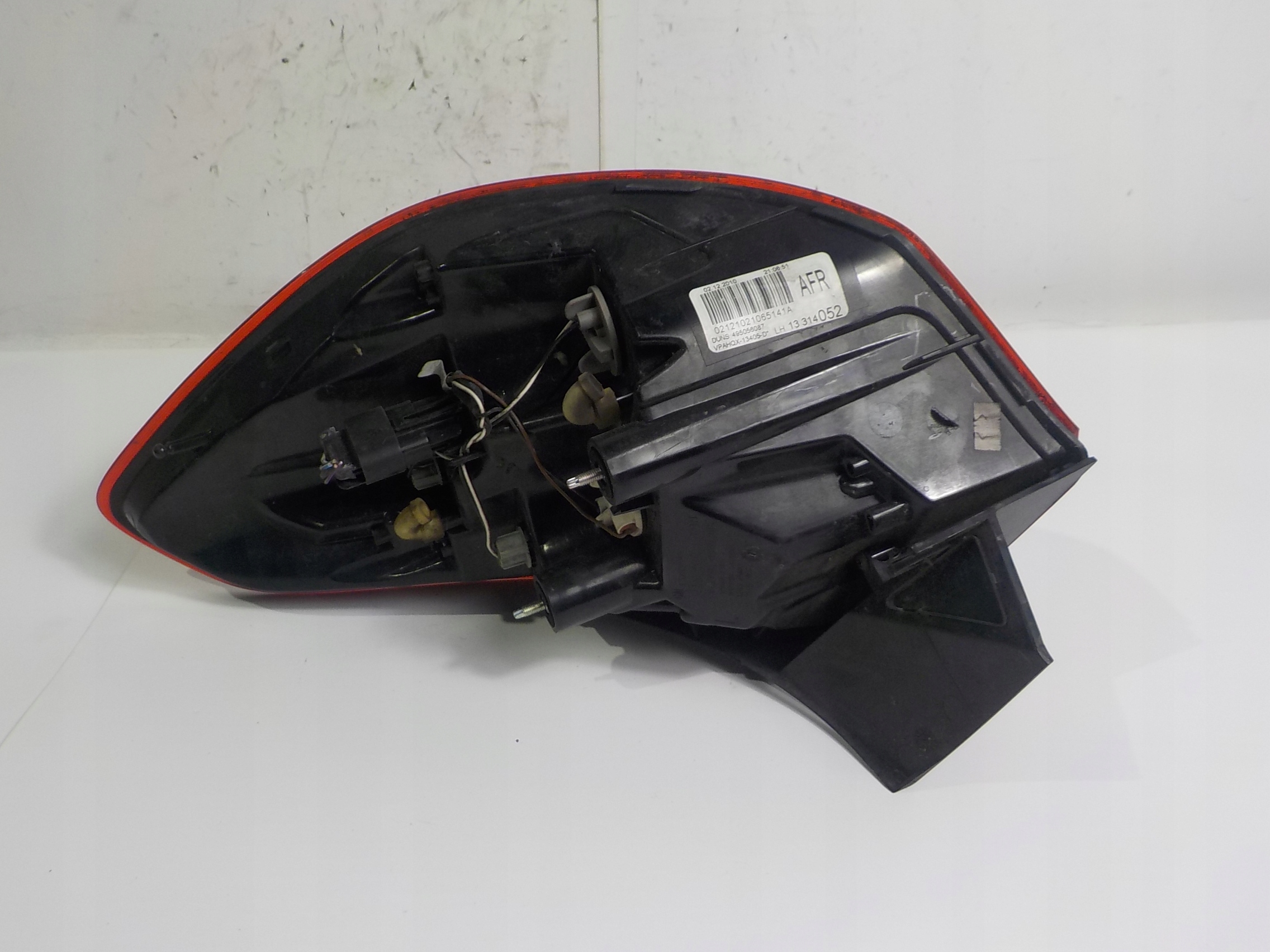 OPEL ASTRA IV J KOMBI light left rear left rear part CIEMNA
