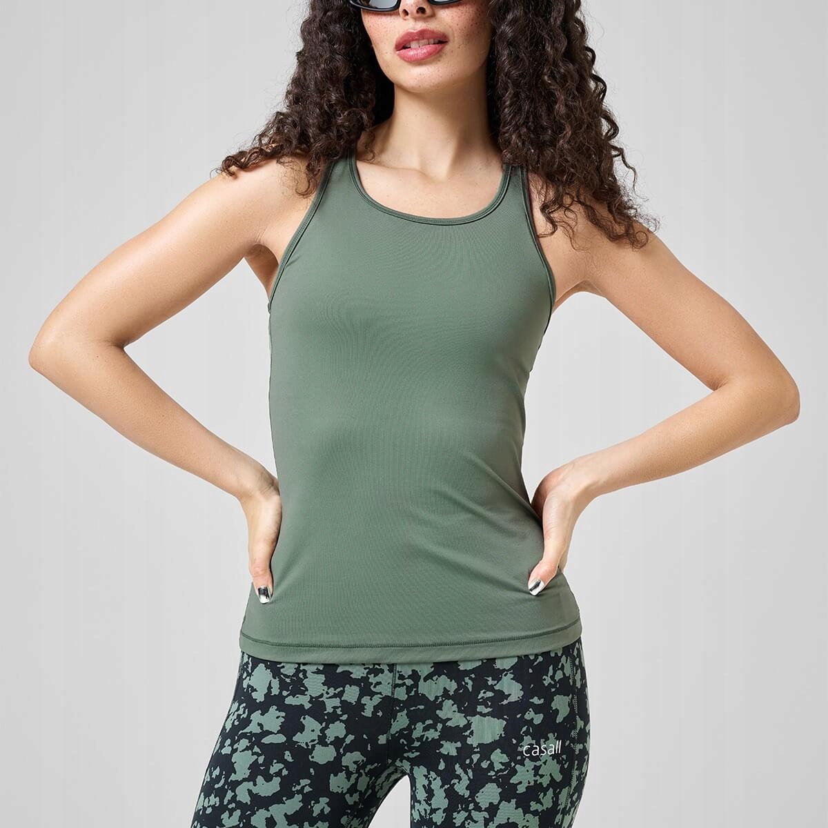 Dámské sportovní tričko Casall Essential Racerback 38 pro fitness jógu